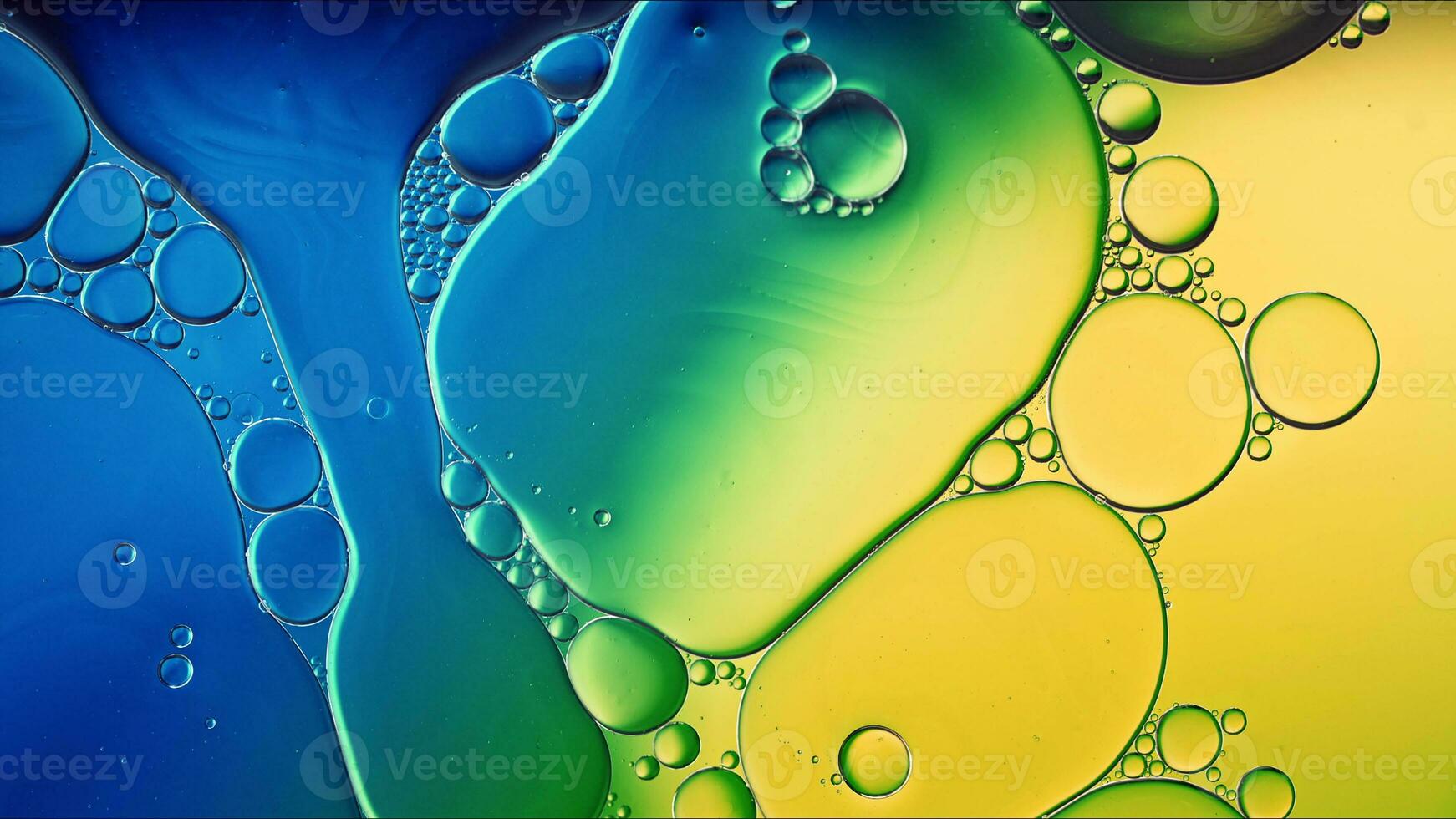 Abstract Colorful Food Oil Drops Bubbles and spheres Flowing on Water Surface photo