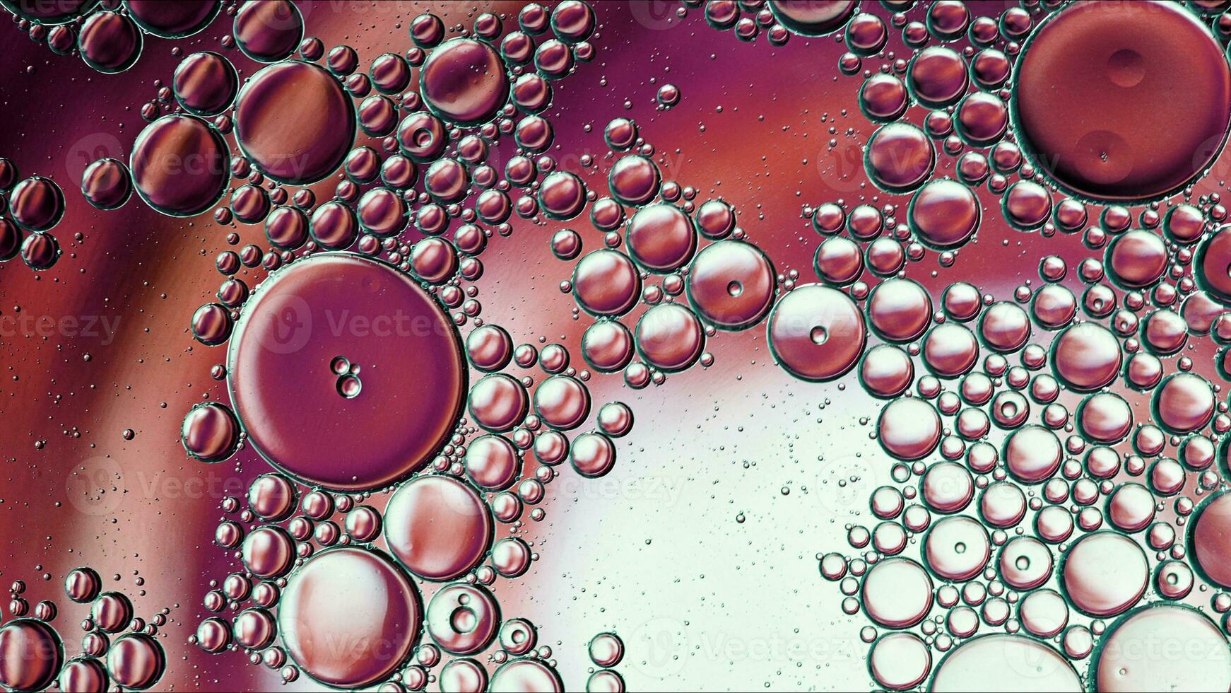 Abstract Colorful Food Oil Drops Bubbles and spheres Flowing on Water Surface photo