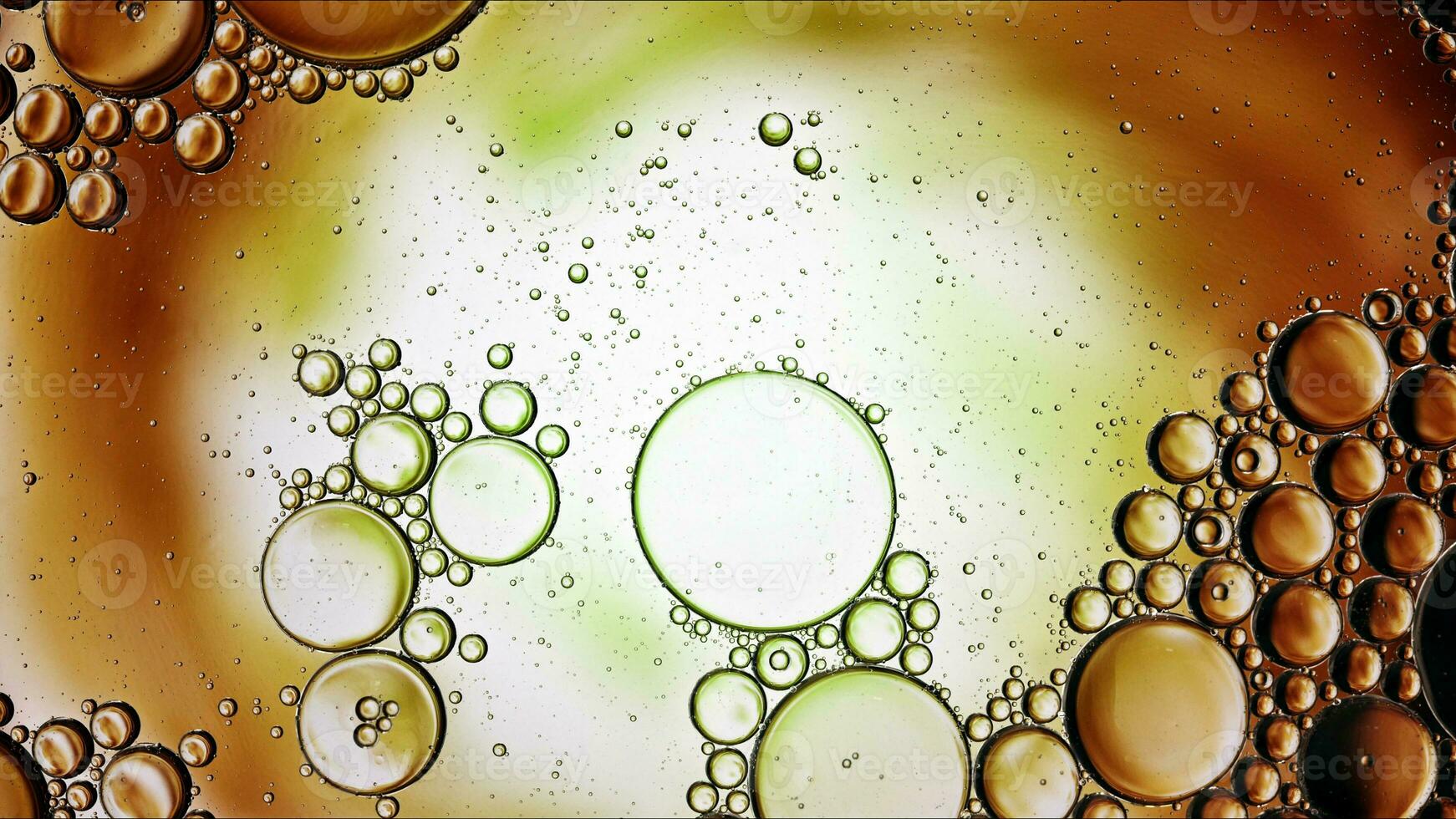 Abstract Colorful Food Oil Drops Bubbles and spheres Flowing on Water Surface photo