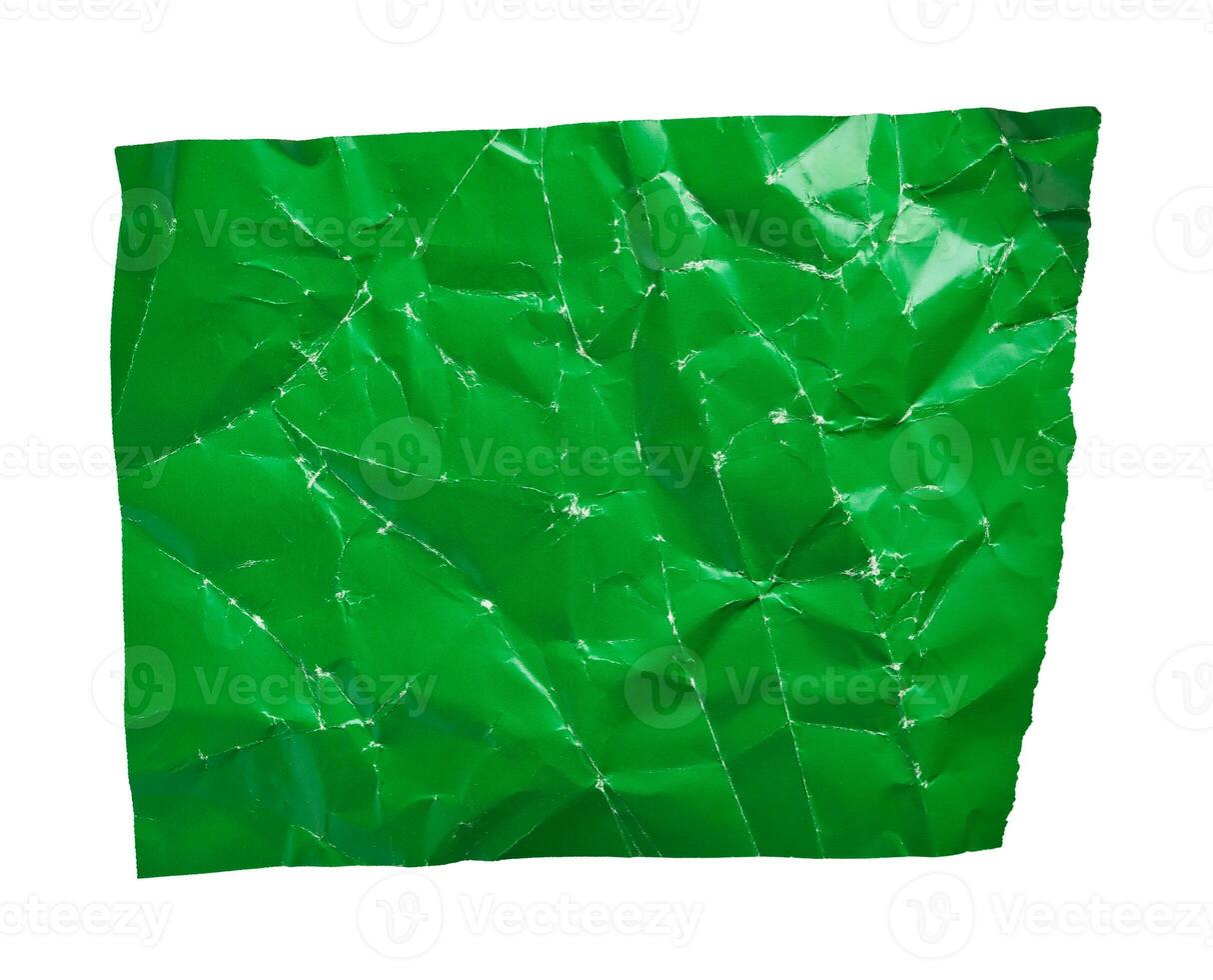 Green crumpled paper with folds texture cut out on white background photo