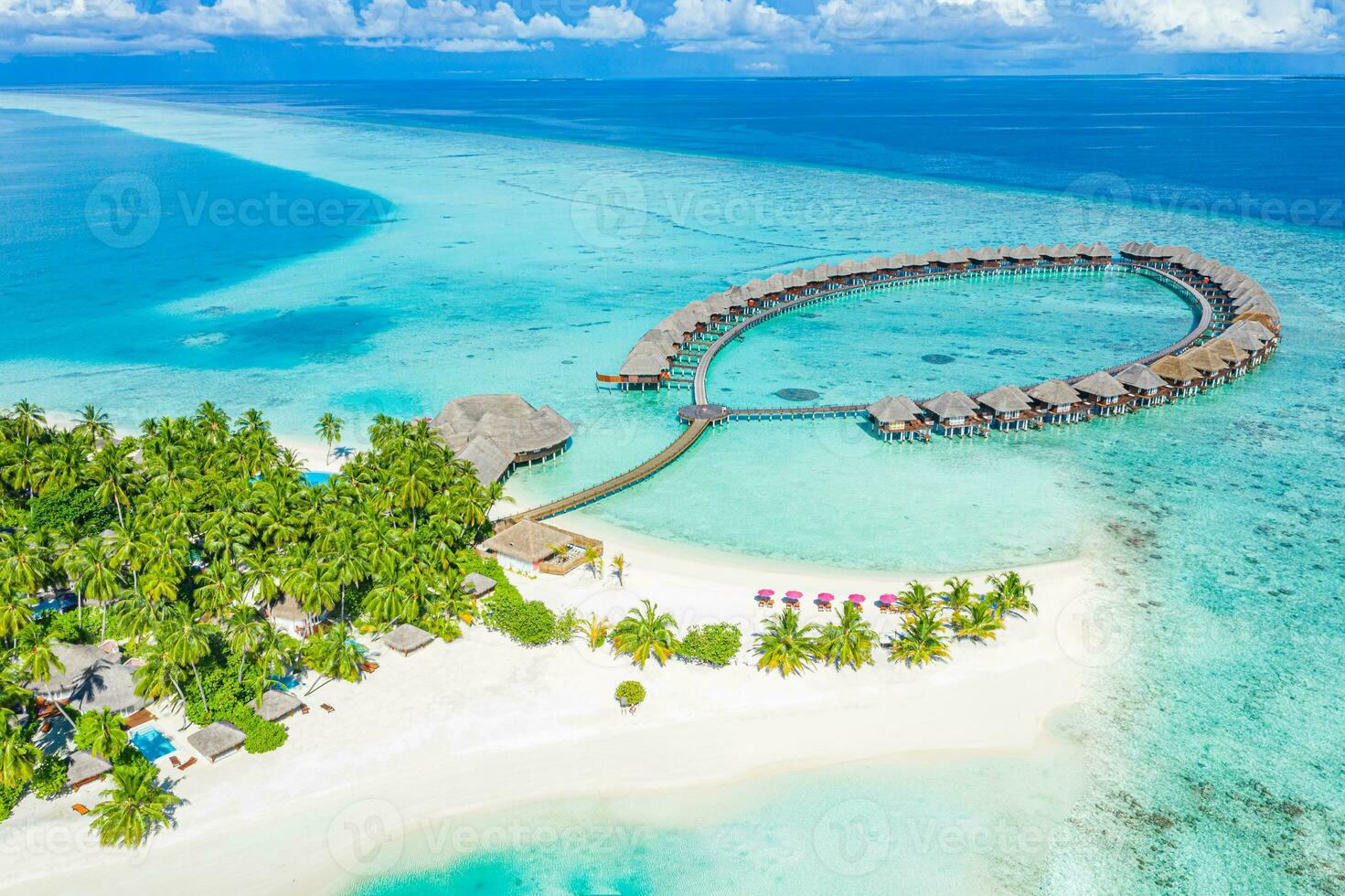 Maldives paradise scenery. Tropical aerial landscape, seascape, water villas with amazing sea and lagoon beach, tropical nature. Exotic tourism destination banner, summer aerial vacation, drone view photo