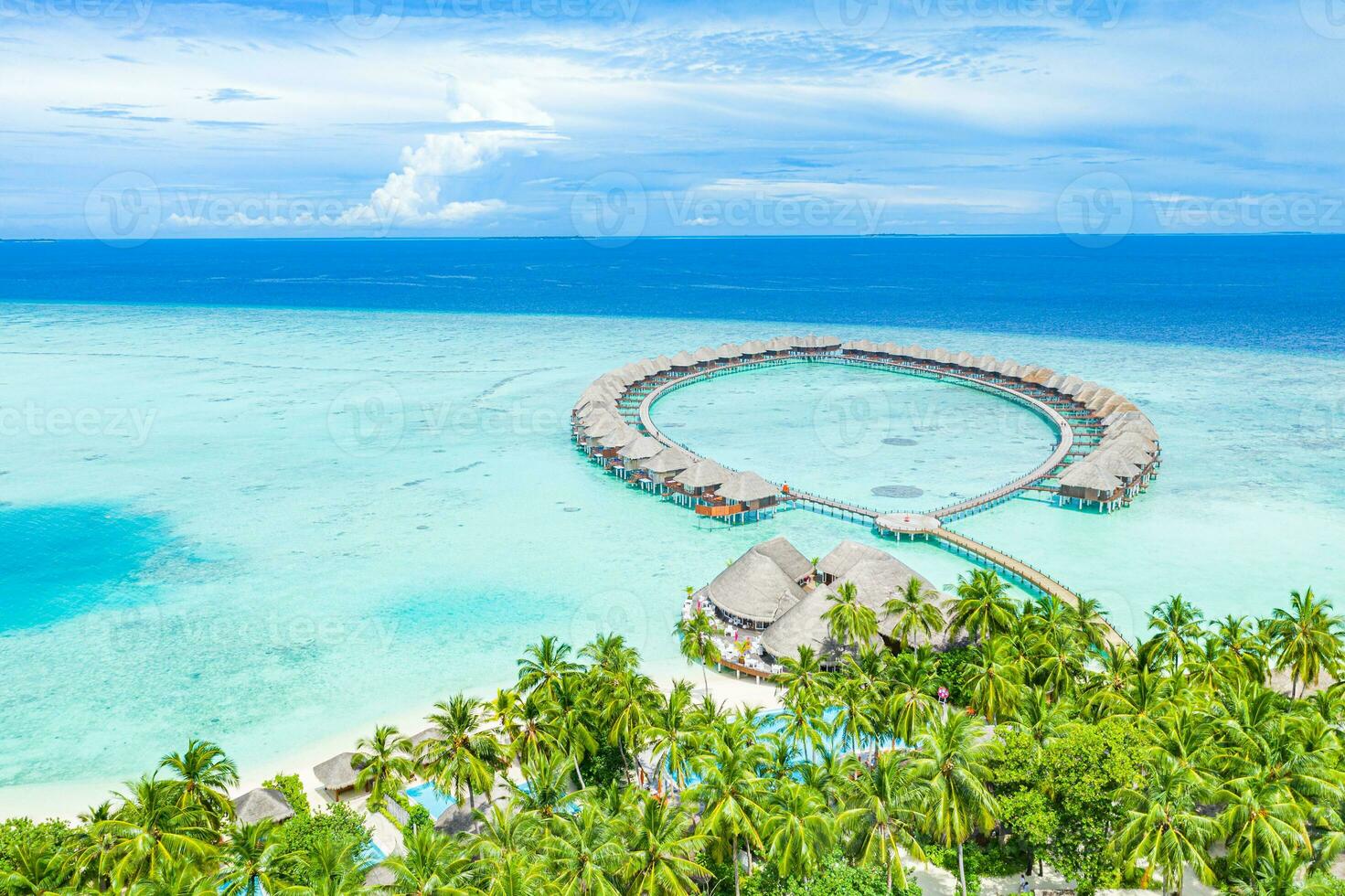 Maldives paradise scenery. Tropical aerial landscape, seascape, water villas with amazing sea and lagoon beach, tropical nature. Exotic tourism destination banner, summer aerial vacation, drone view photo