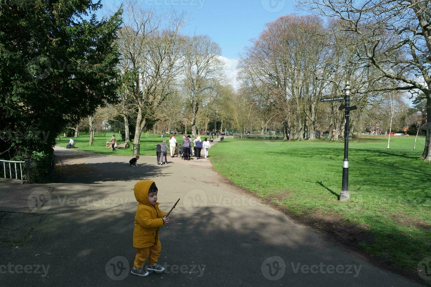 Cute Asian Pakistani Baby Ahmed Mustafain Haider is Enjoying The Beautiful Sunny Day at Wardown Public Park of Luton Town of England UK. Image Was Captured on 03-April-2023 photo