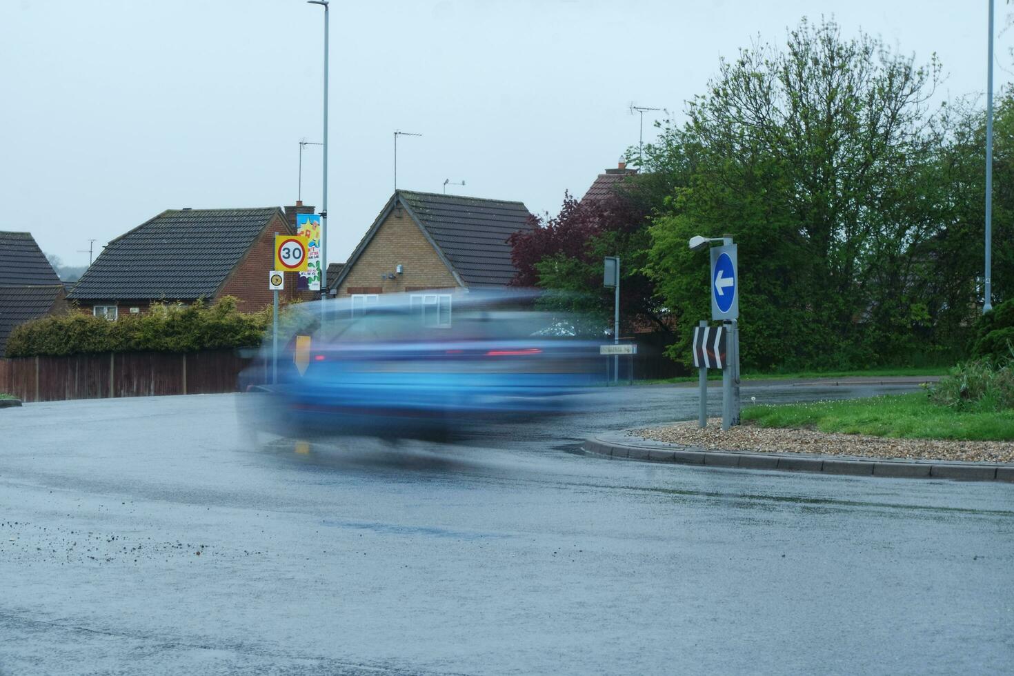 Low Angle View of British Road and Traffic During Rainy Day at Luton Town of England UK. April 24th, 2023 photo
