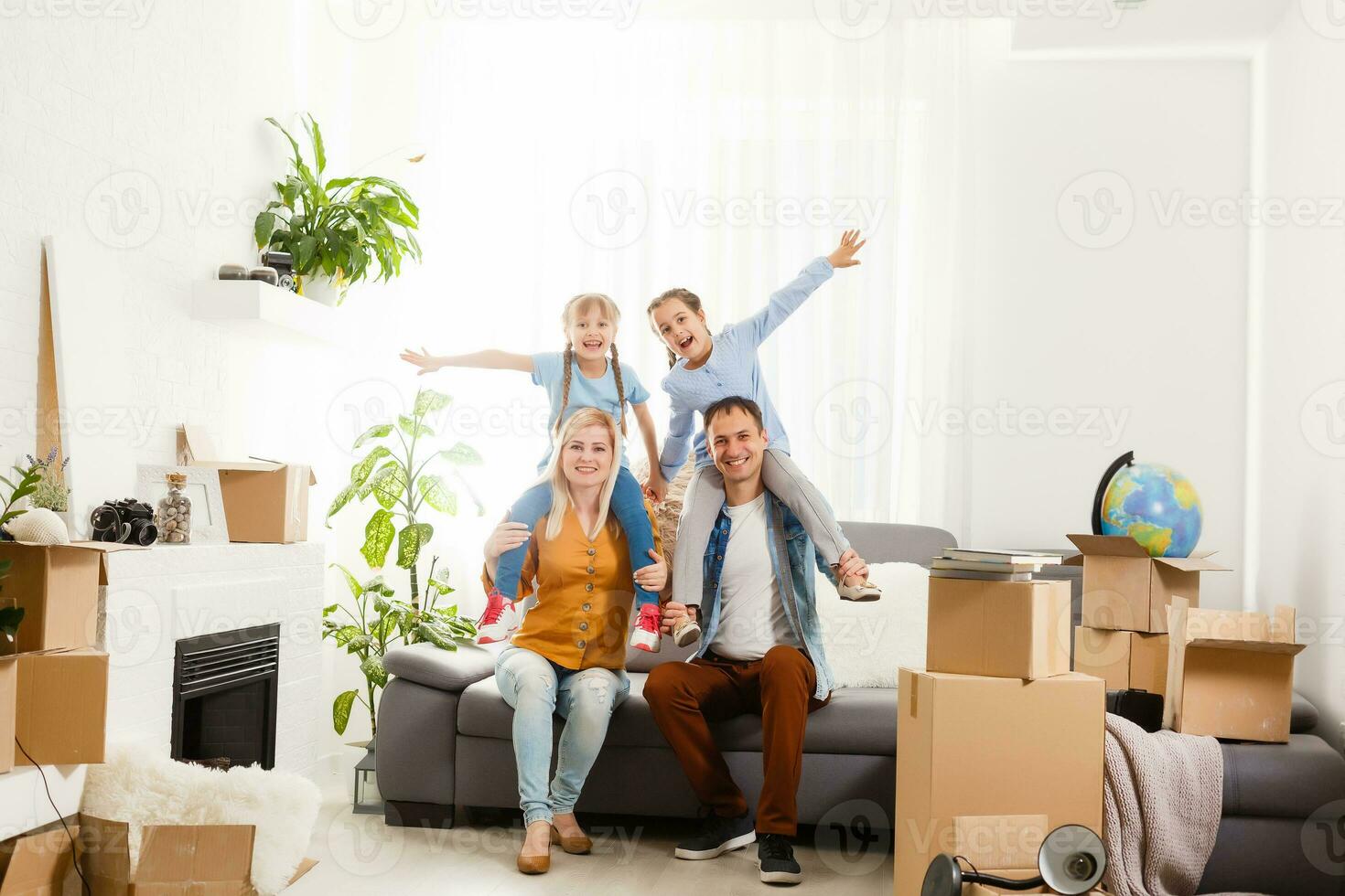 family moving into their new home photo