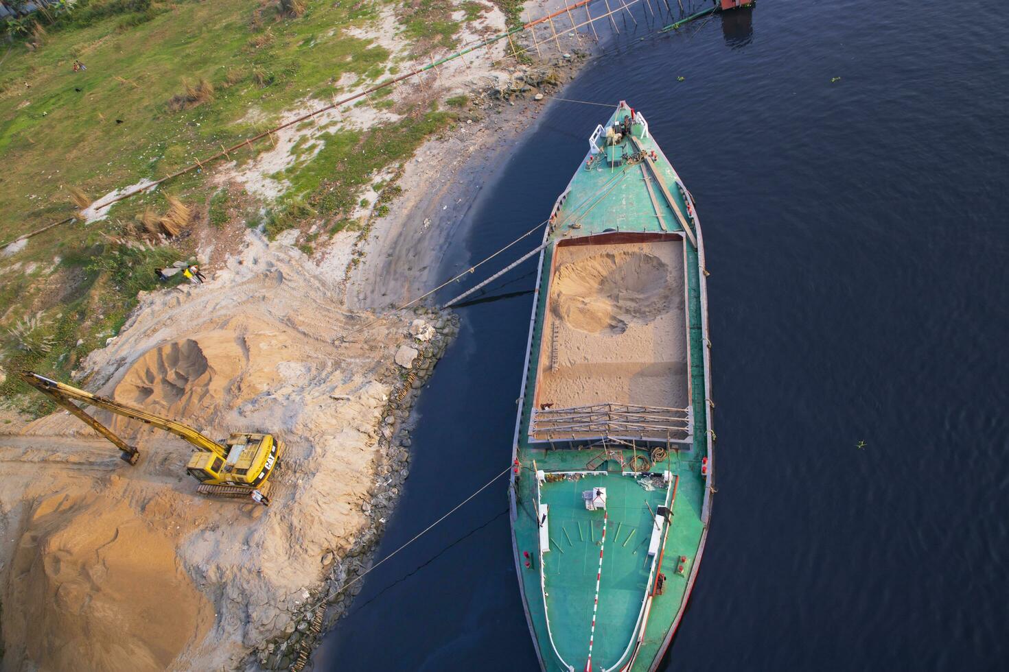 Top view of Sand bulkheads ships Waiting for unloaded in Sitalakhya River, Narayanganj, Bangladesh photo