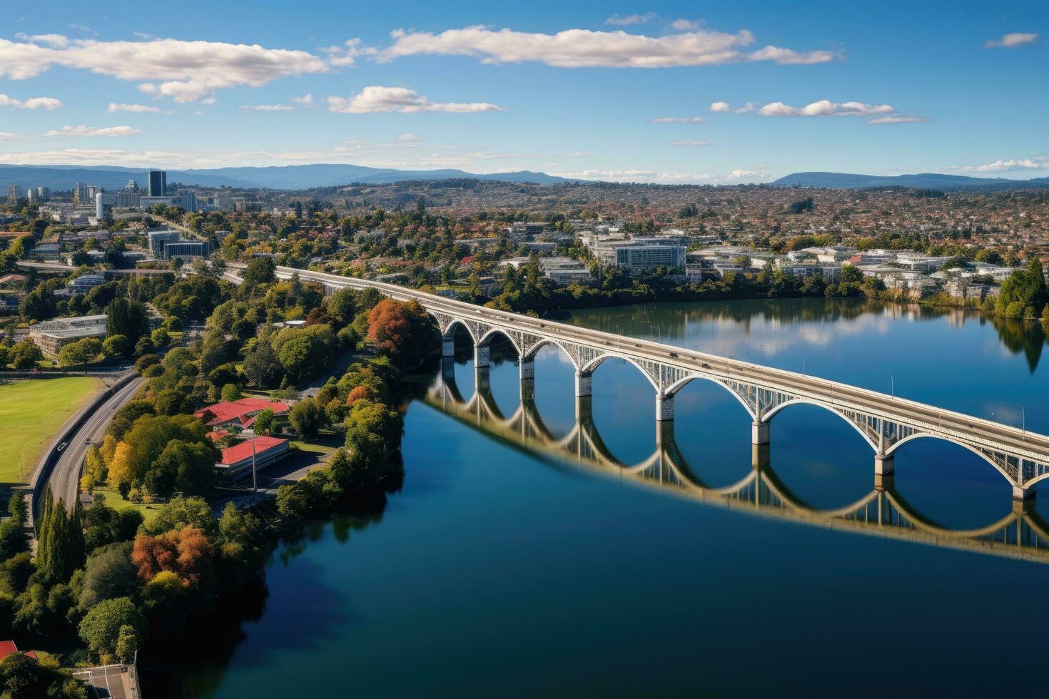 AI generated Aerial view of the bridge over the lake in the city of Denver, Colorado, Aerial drone panoramic view looking at Victoria Bridge over the Waikato River as it traverses the city photo