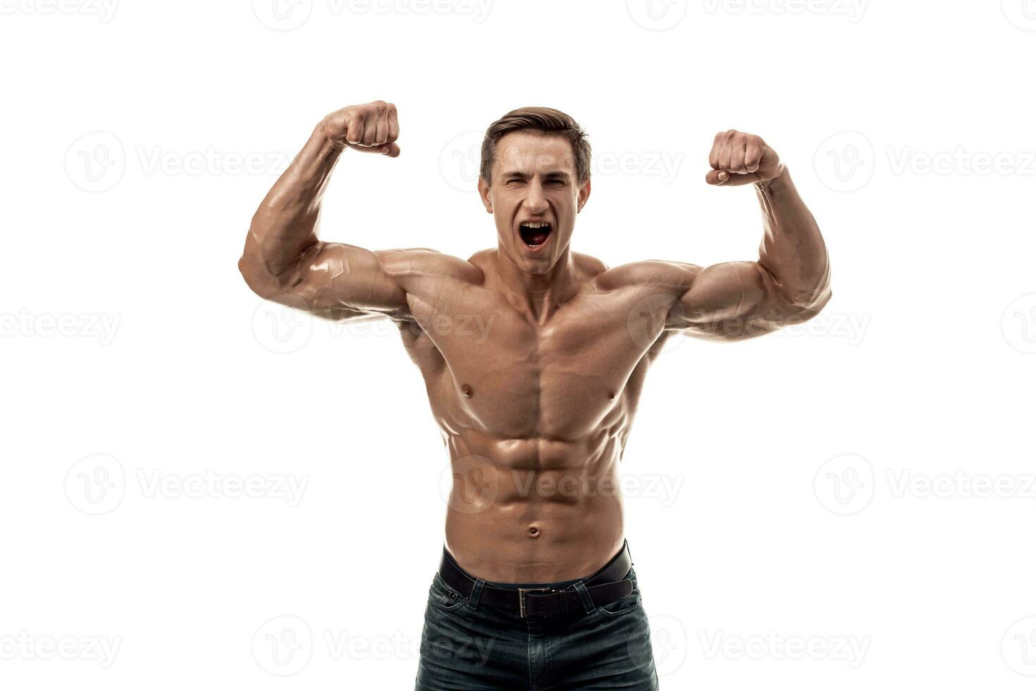 Muscular handsome young man with naked torso. Isolated on white background. photo