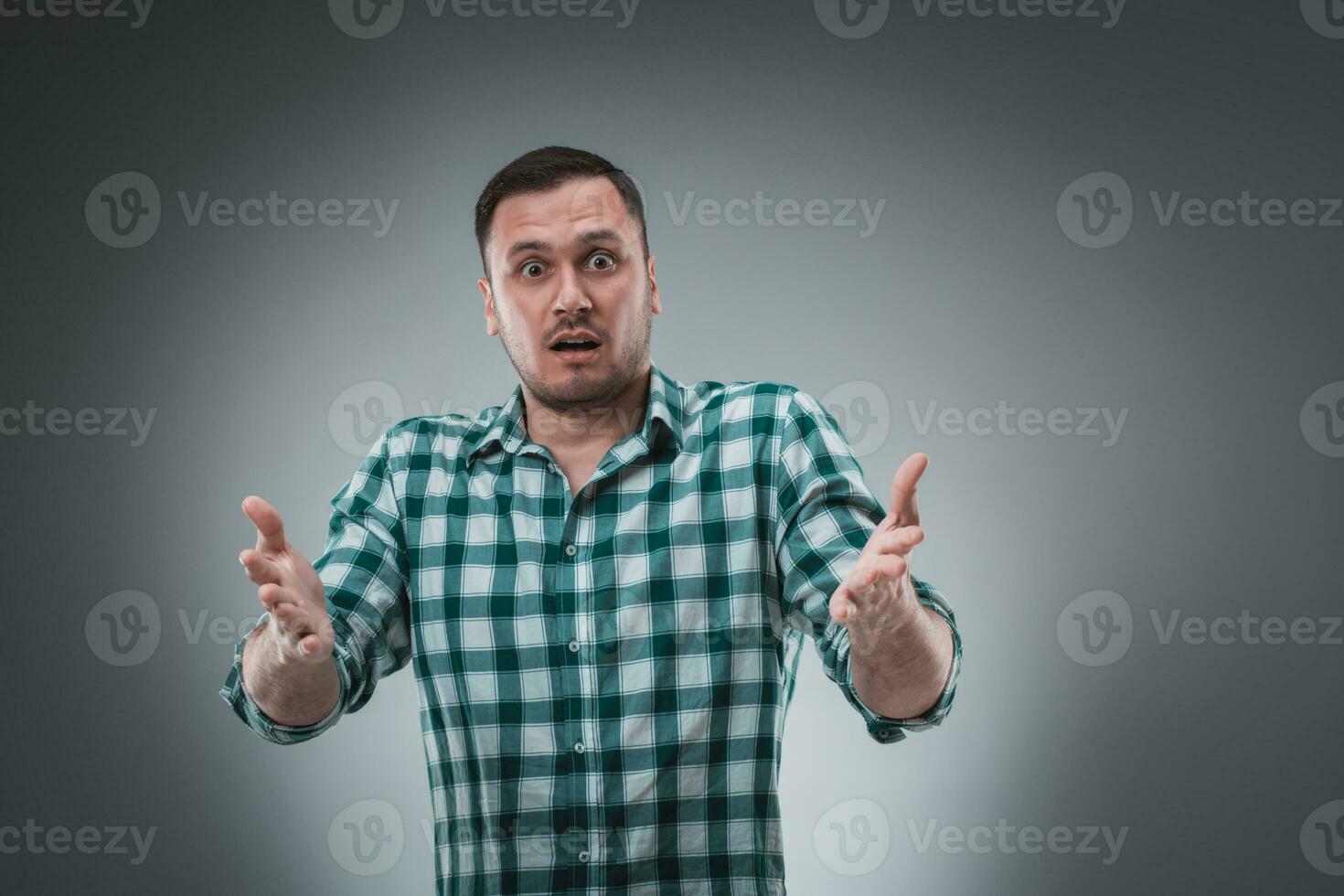 Portrait of man isolated on gray background. Man showing different emotions. photo
