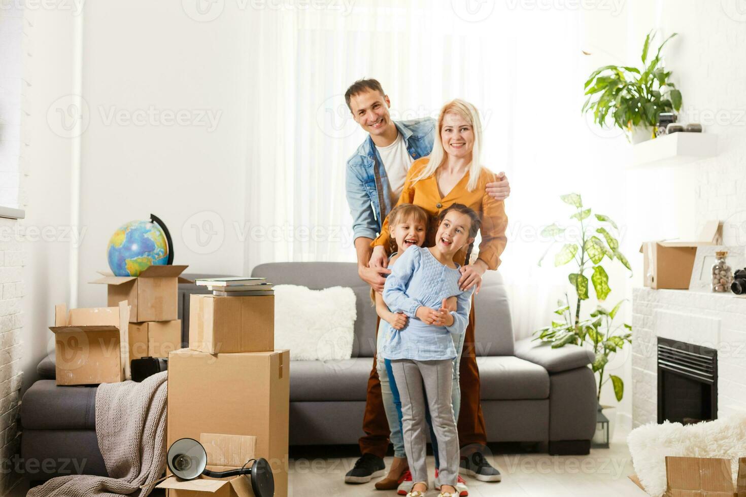 family moving into their new home photo