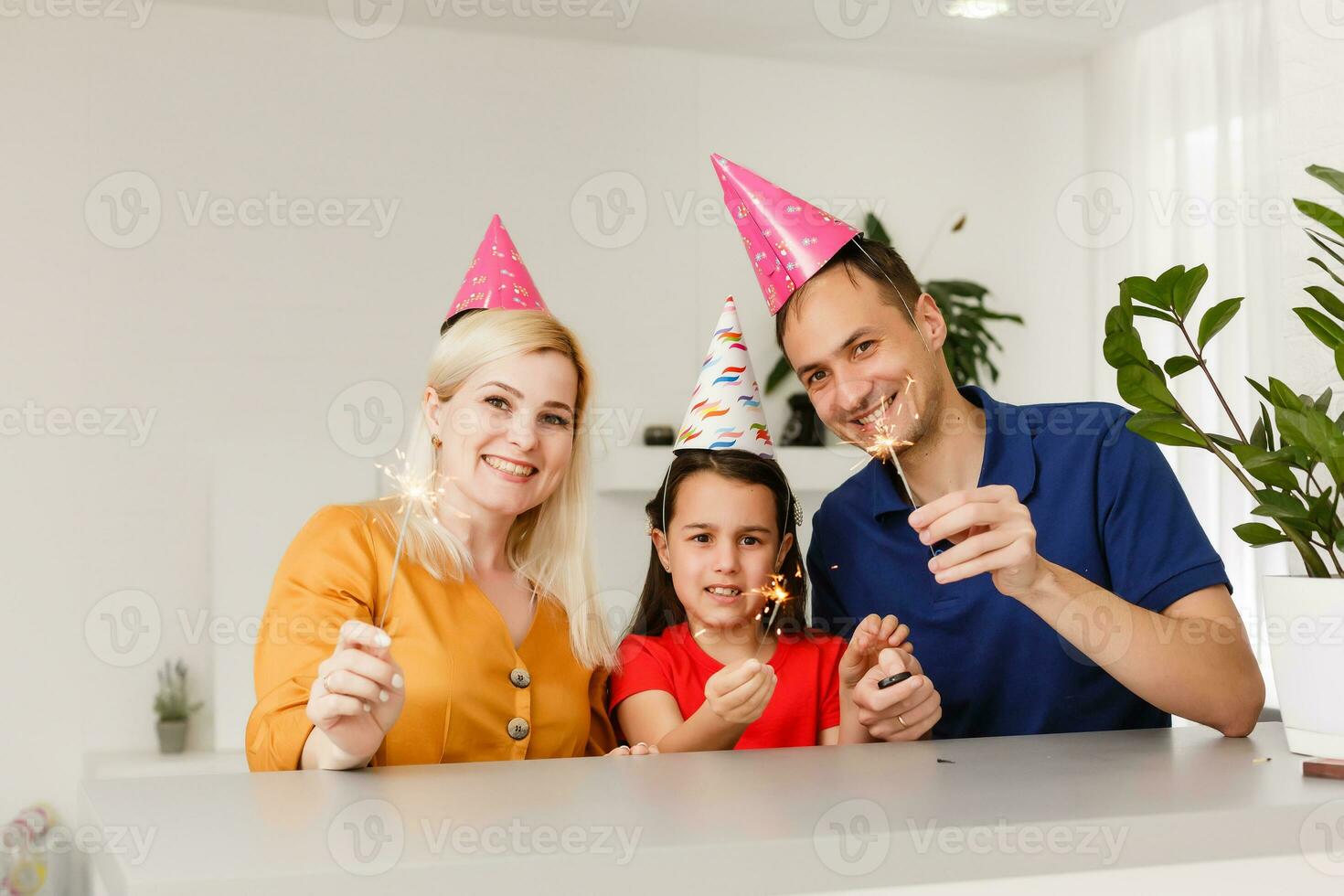 Happy family celebrating birthday via internet in quarantine time, self-isolation and family values, online birthday party photo