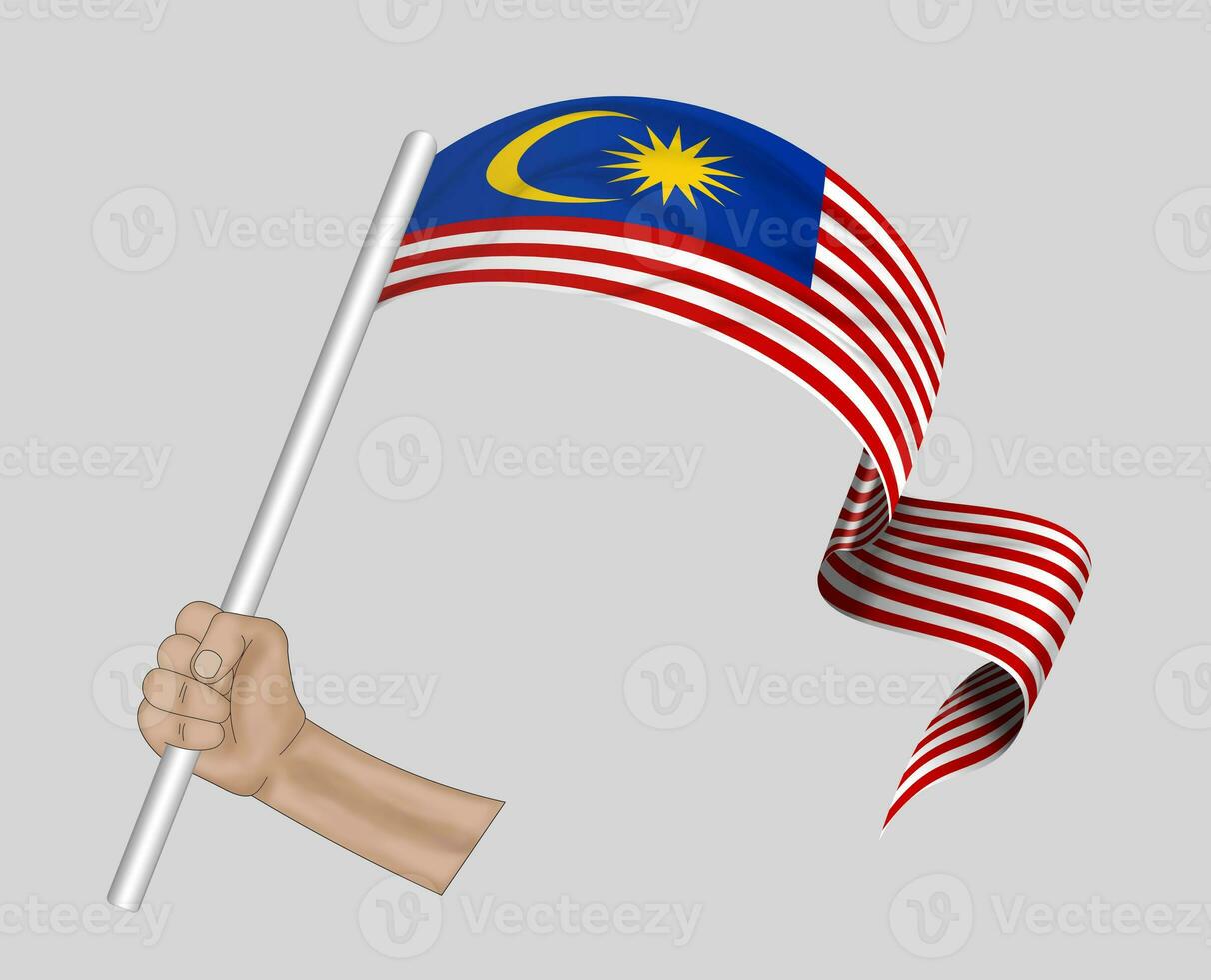 3D Flag on ribbon in hand photo