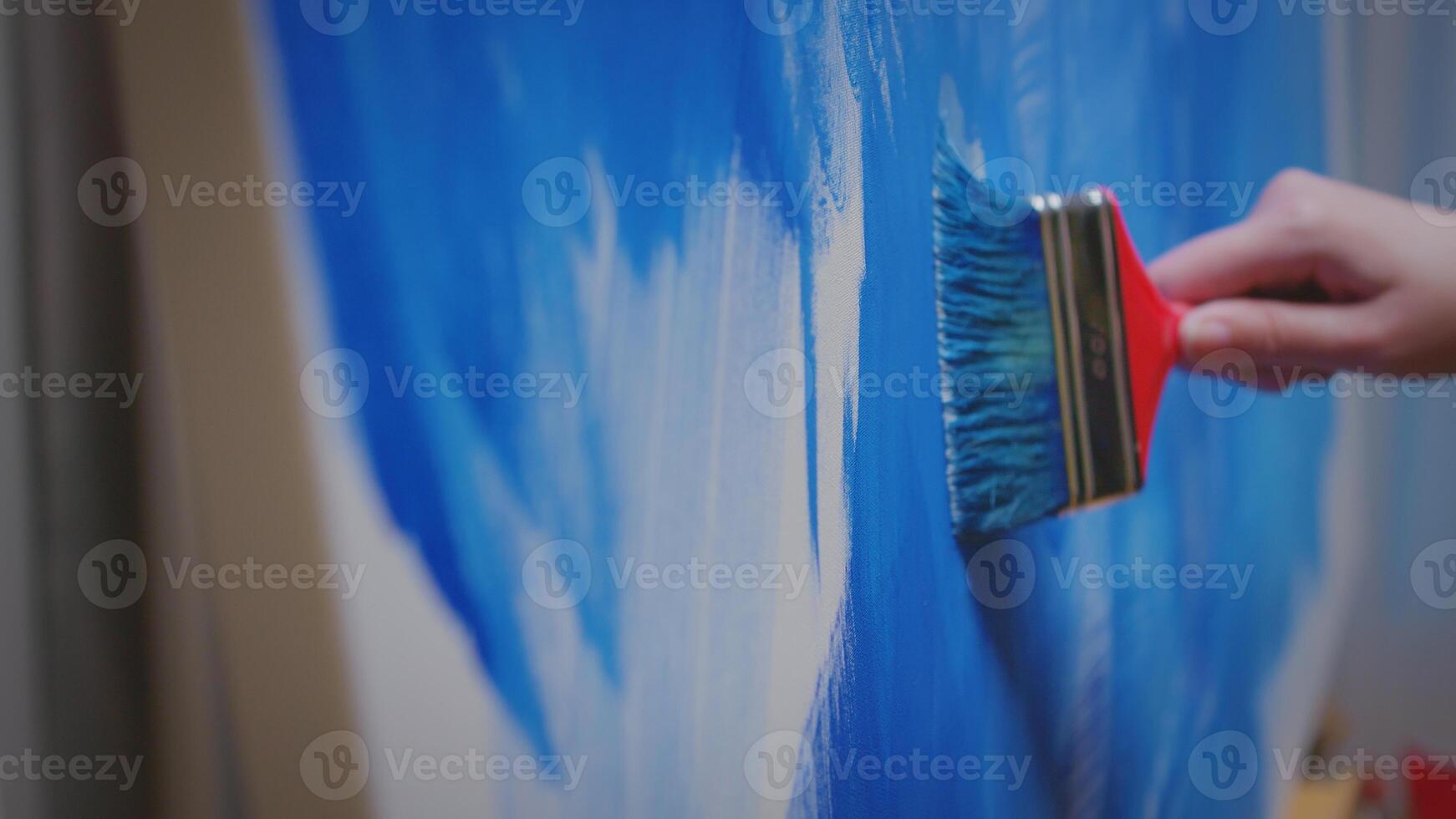 Woman with painting skill in studio. photo