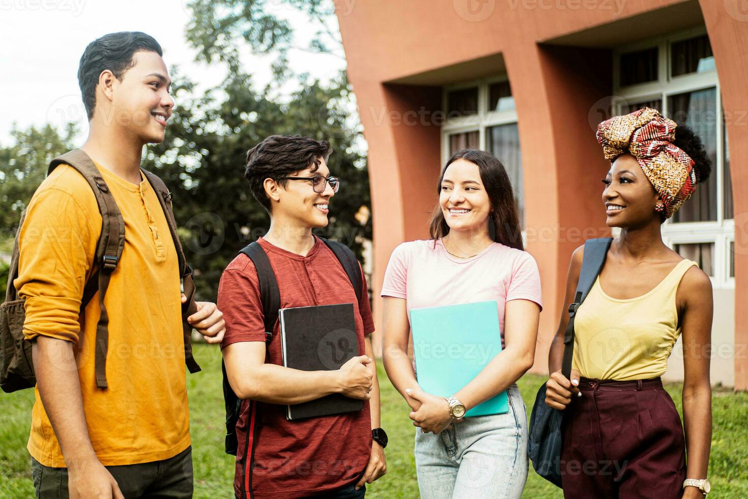 Mixed race group of students at campus university photo