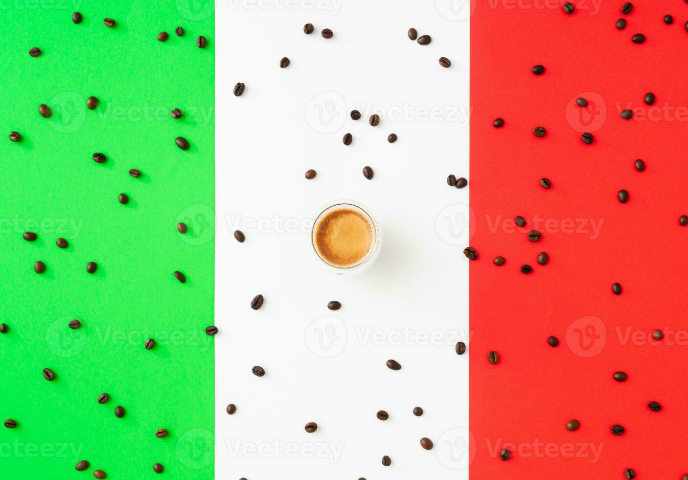 Creative layout made of cup of coffee and coffee beans on flag of Italy as a background. Minimal coffee concept. Trendy espresso idea. Unique flat lay composition. Coffee aesthetic. photo