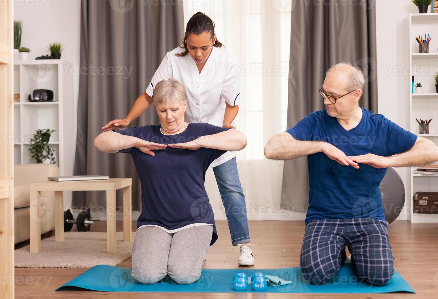 Physiotherapist helping old person to recovery after trauma. Home assistance, physiotherapy, healthy lifestyle for senior old person, training and recovery with professional physiotherapist photo