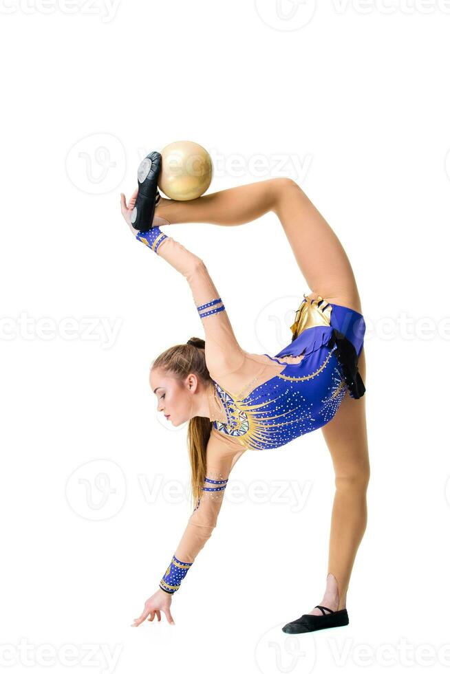 teenager doing gymnastics exercises with gymnastic ball. isolated photo