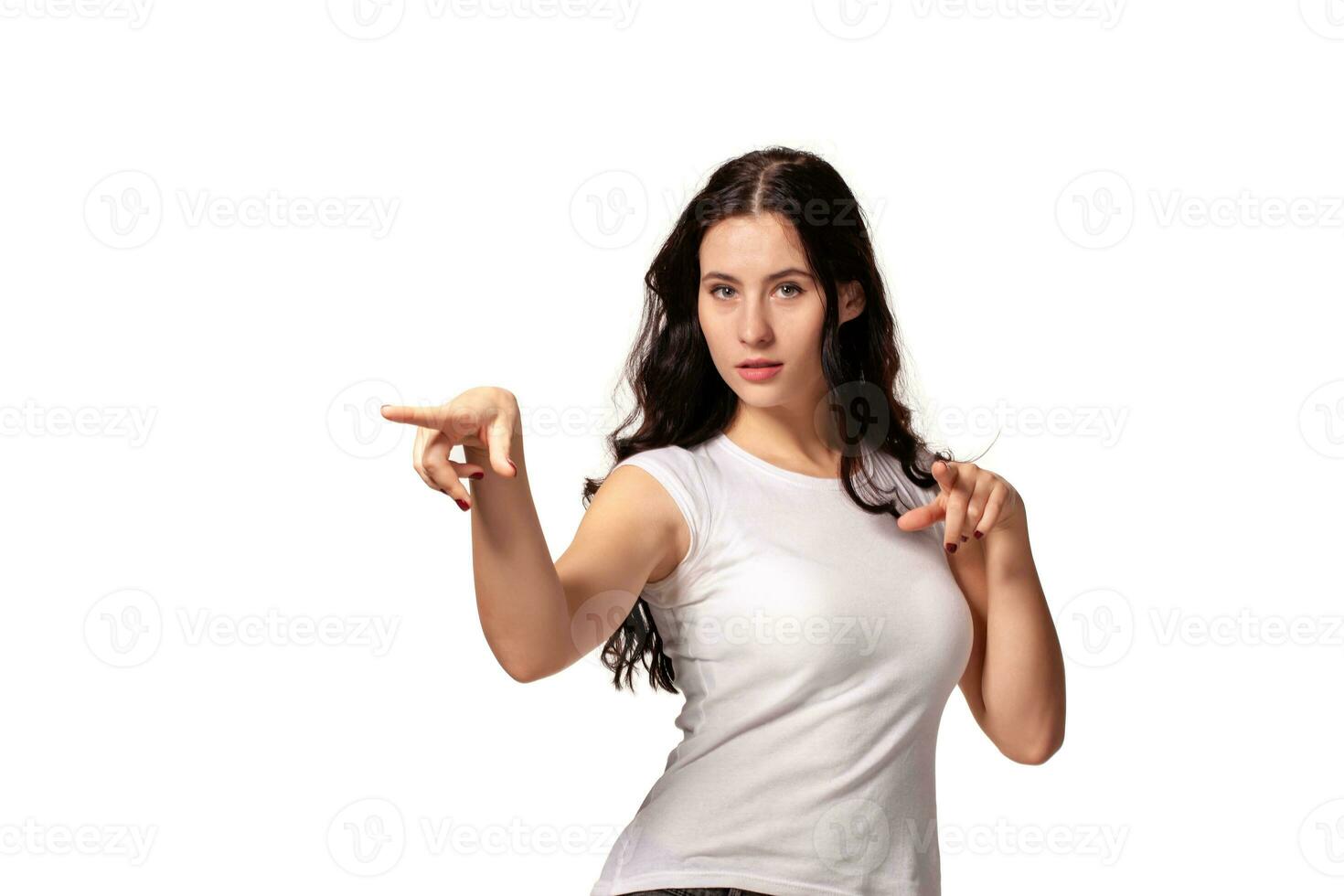 Young girl in white dress points to someone the finger photo