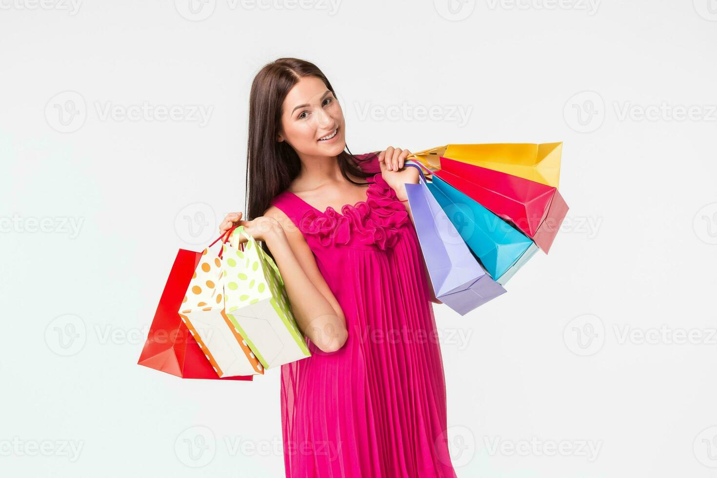 Happy young smiling woman with shopping bags after shopping photo