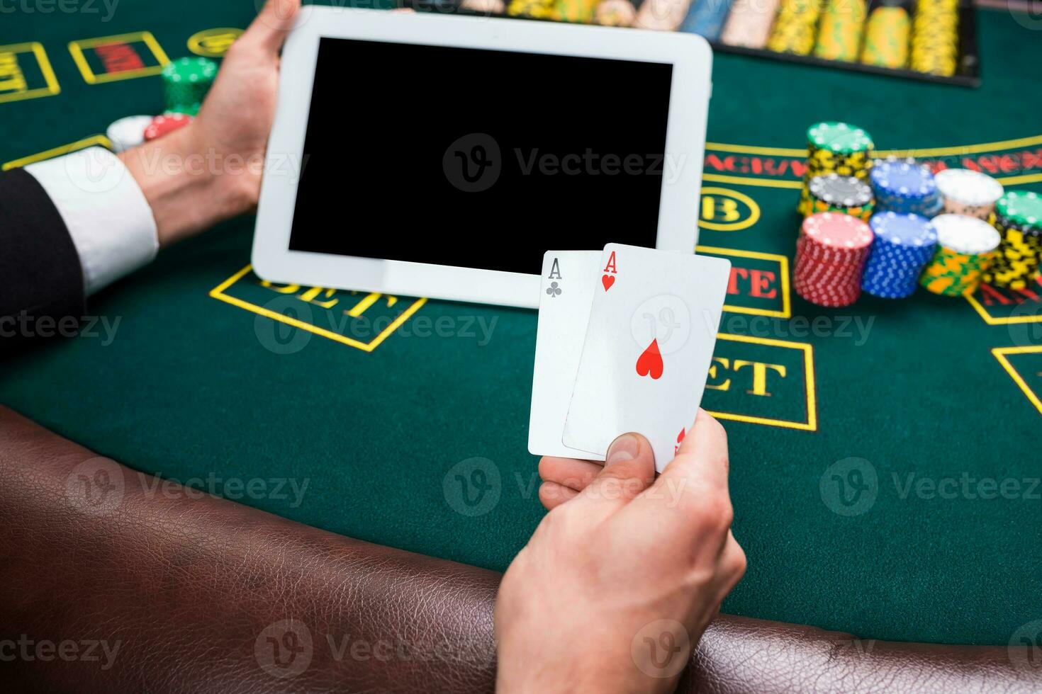 casino, online gambling, technology and people concept photo
