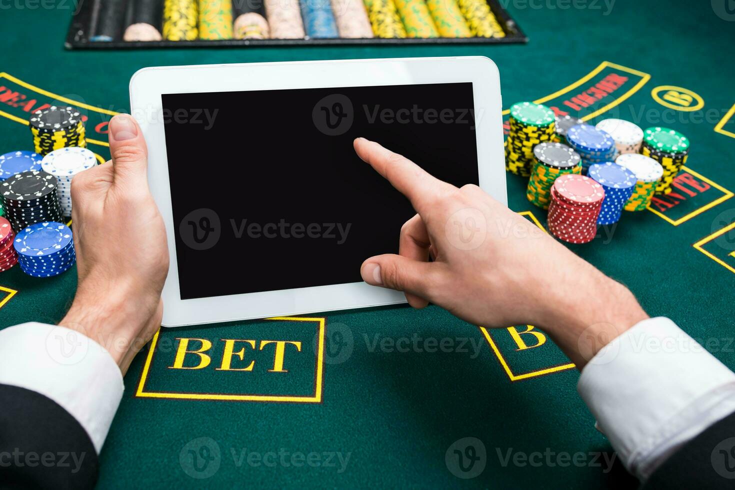 casino, online gambling, technology and people concept photo