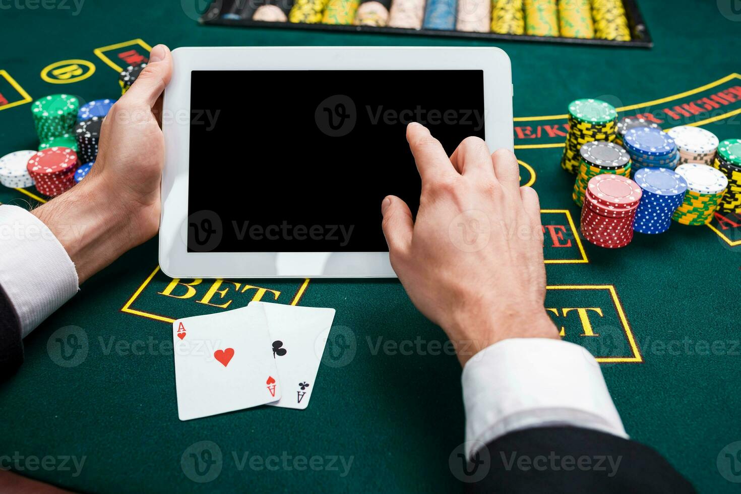 casino, online gambling, technology and people concept photo