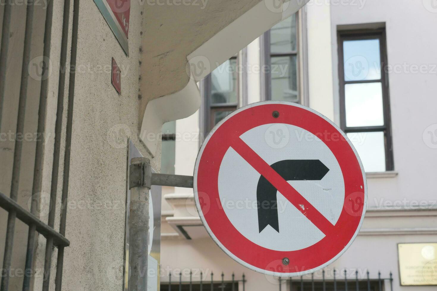 No Left Turn Sign traffic sign against blue sky photo