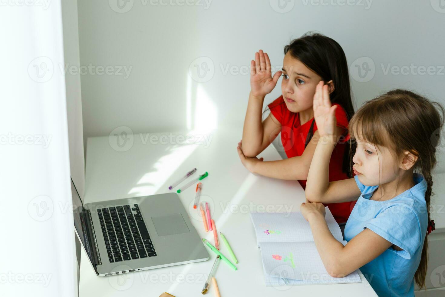 Learning from home, Home school kid concept. Little children study online learning from home with laptop. Quarantine and Social distancing concept. photo