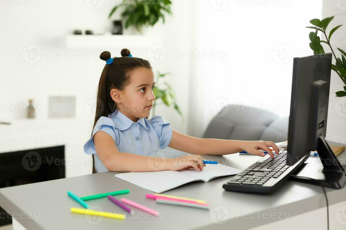 Little Girl Using Computer Concept, distance online learning photo