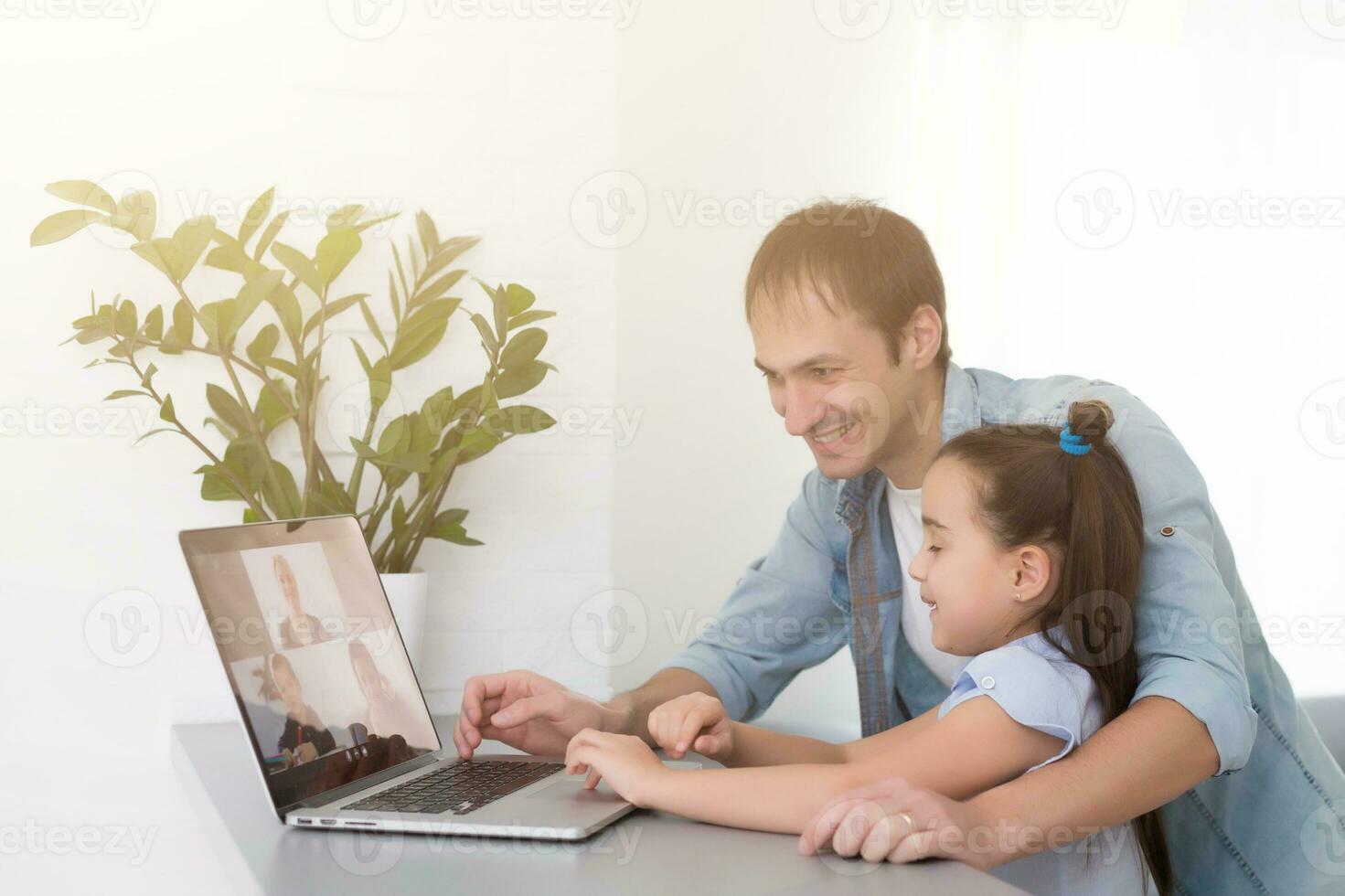 Digital composite of People using a computer with E-Learning information in the screen photo