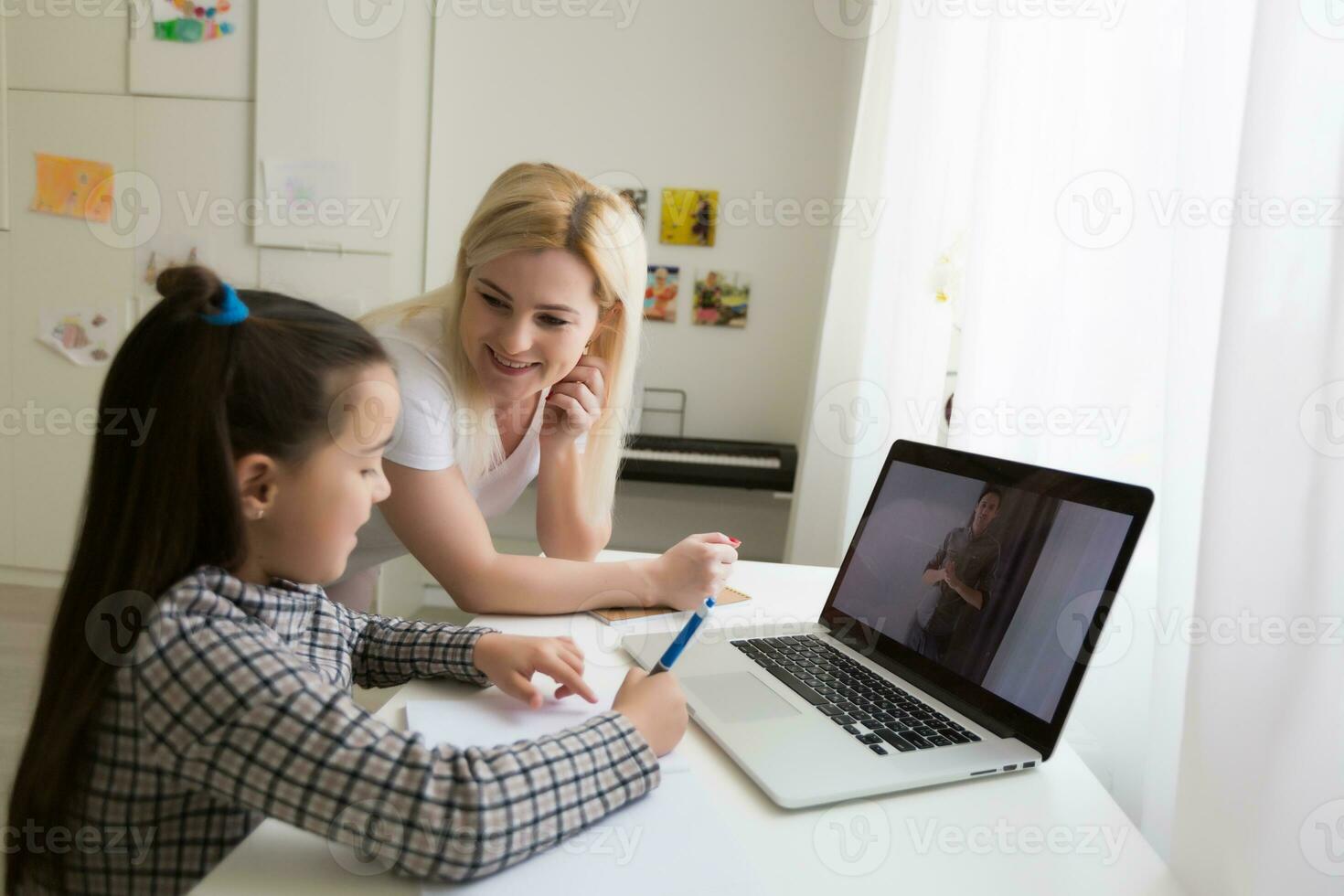 Digital composite of People using a computer with E-Learning information in the screen photo