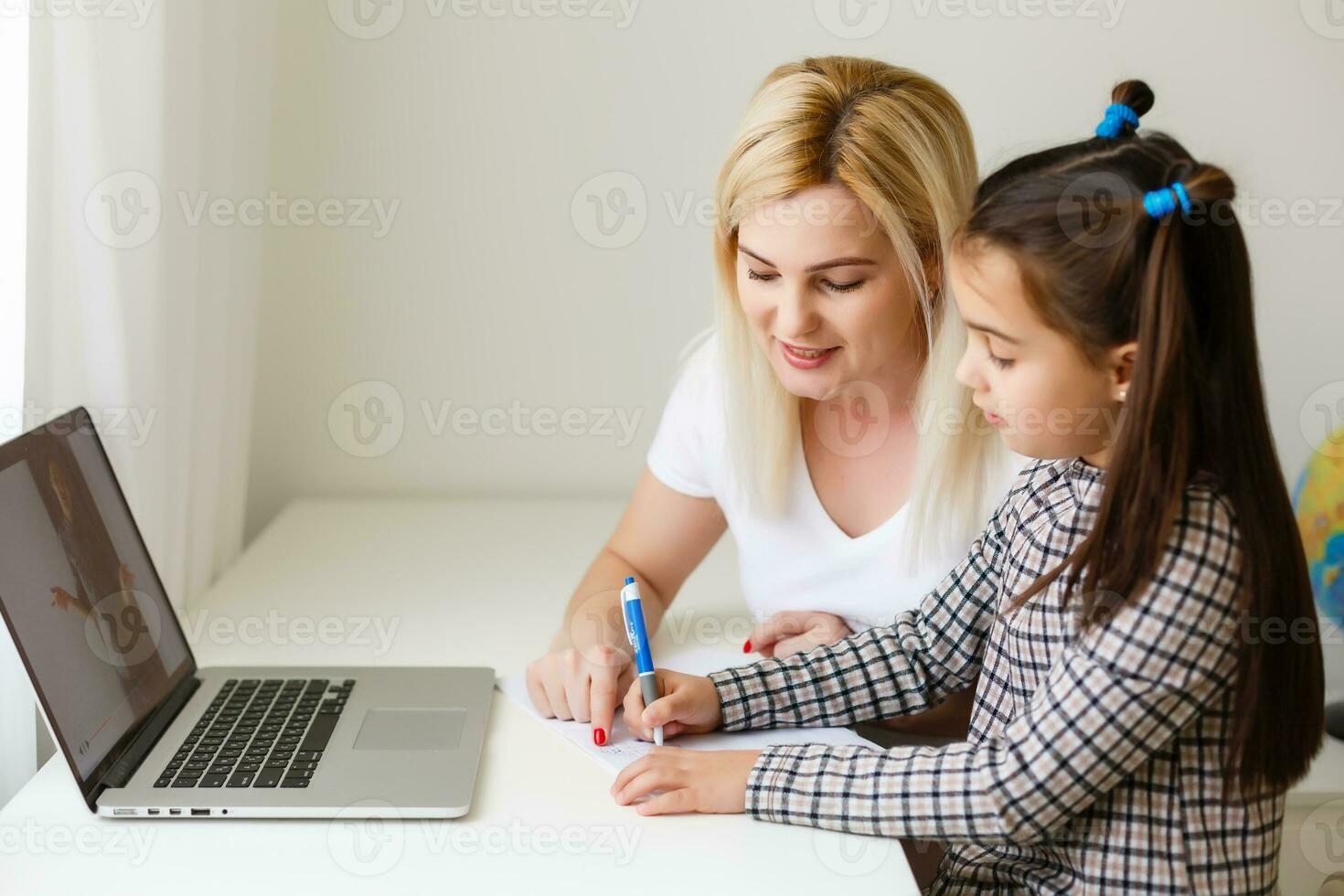 Digital composite of People using a computer with E-Learning information in the screen photo