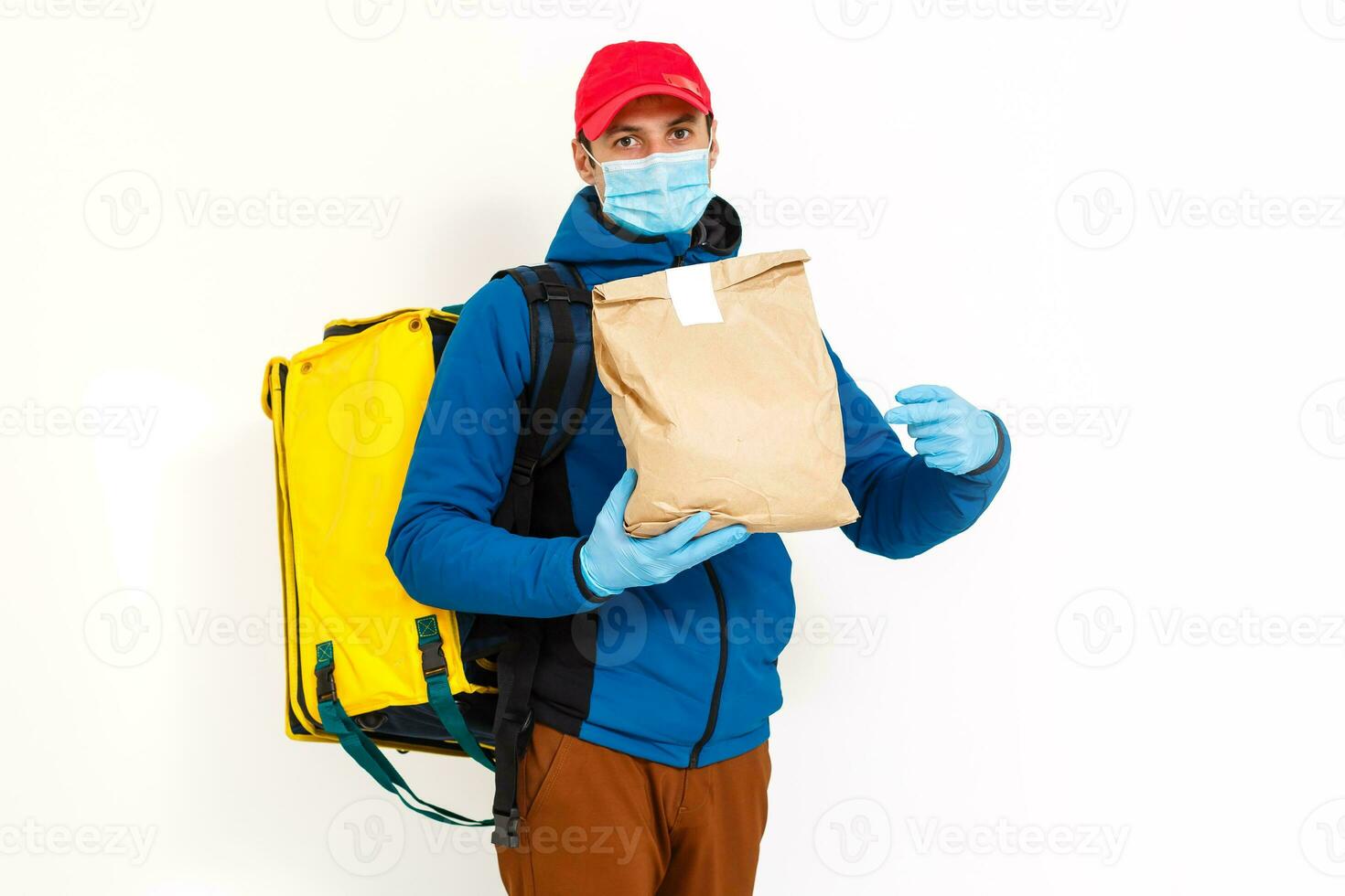 delivery man send food bag at door knob for contactless or contact free from delivery rider in front house for social distancing for infection risk. photo