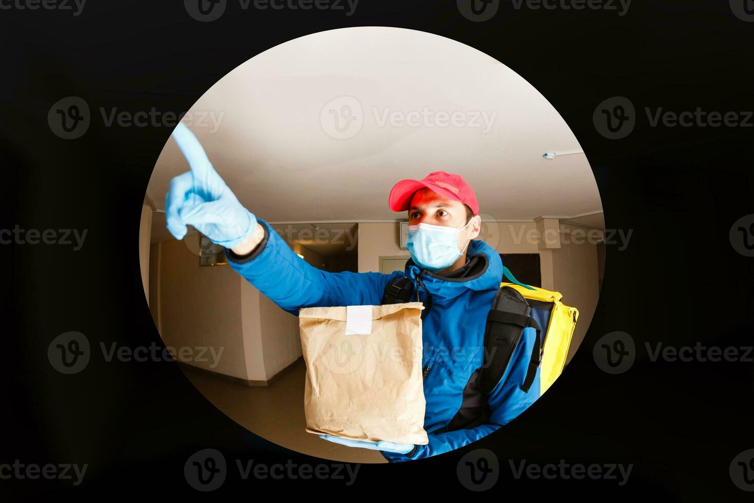 delivery man send food bag at door knob for contactless or contact free from delivery rider in front house for social distancing for infection risk. photo