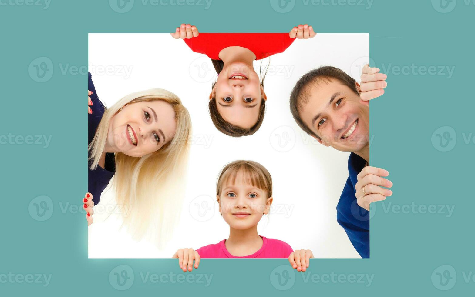 family holds holds photo canvas at home