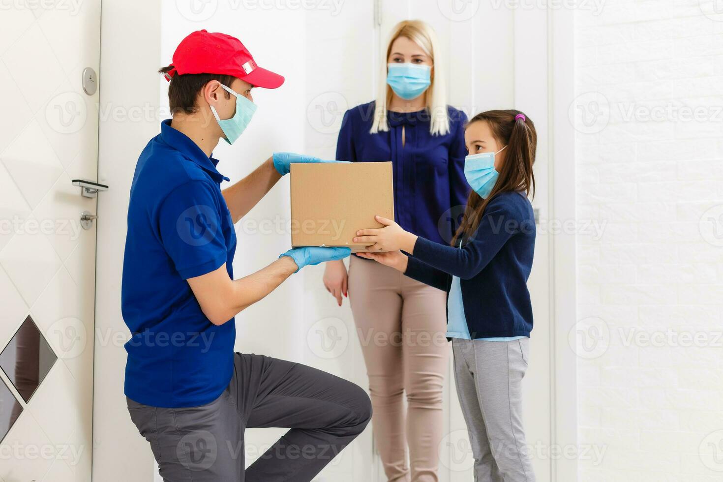 Courier delivering a parcel, delivery of things during quarantine photo