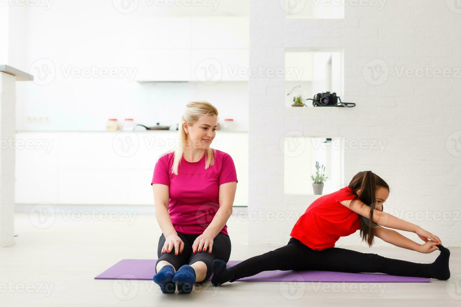 Living room fitness workout girl doing exercises at home. Young woman training muscles, healthy lifestyle without going to the gym. photo