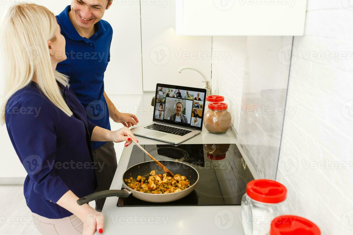 Hello friends. Couple conversation in video chat in kitchen photo