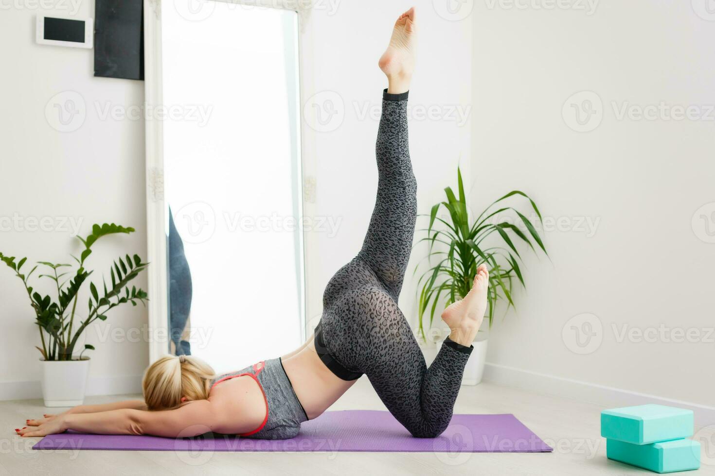 woman doing exercises at home photo