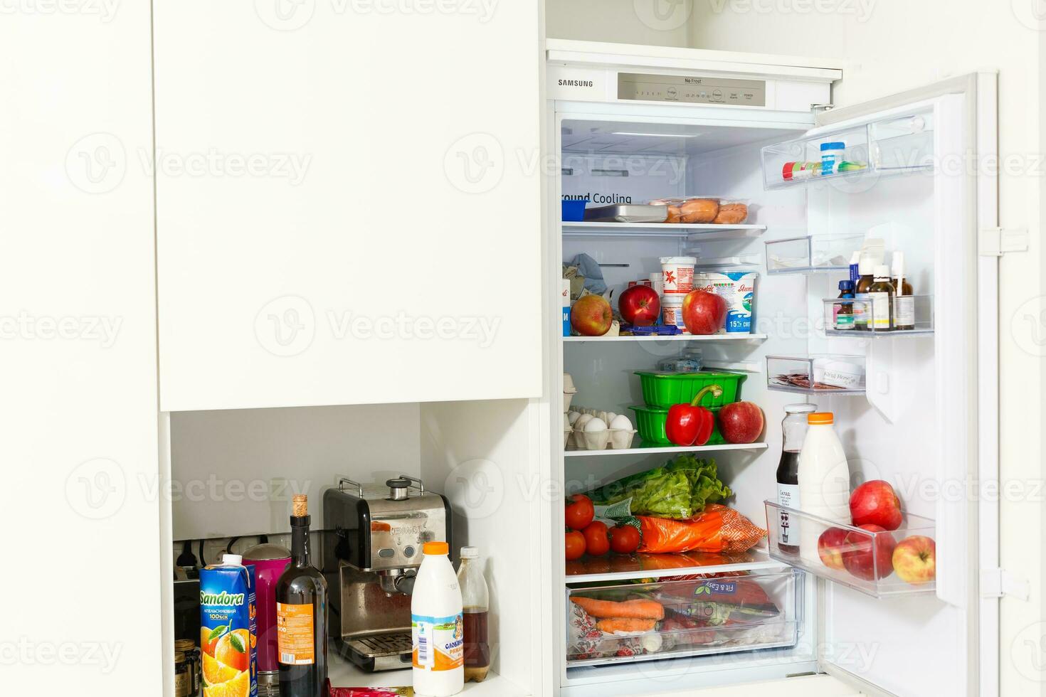 open refrigerator filled with food photo