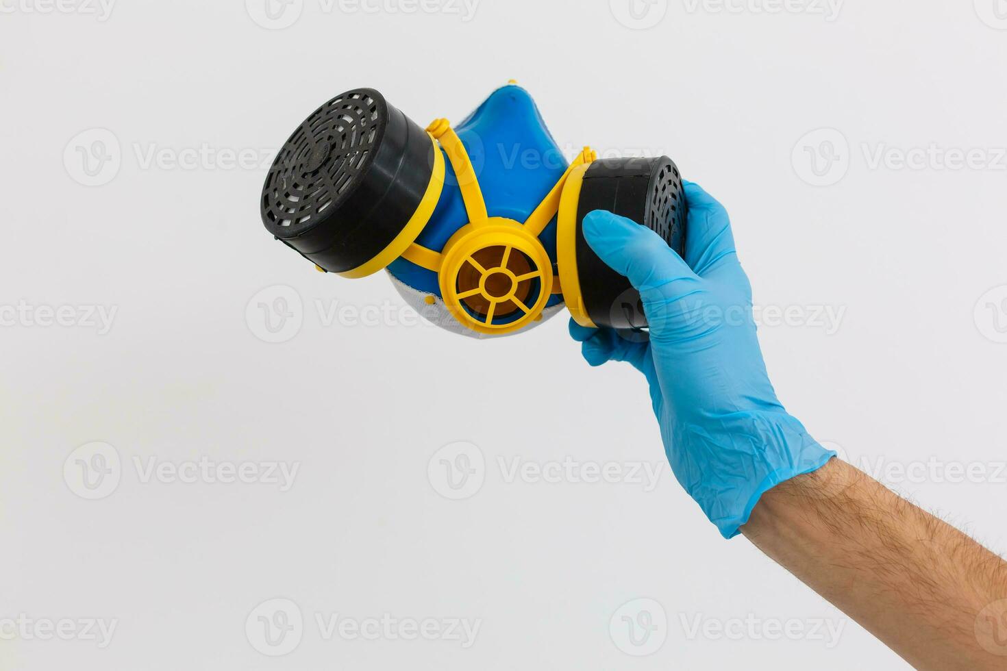 hand with medical gloves hold masks and other medical equipments, gestures in gloves photo