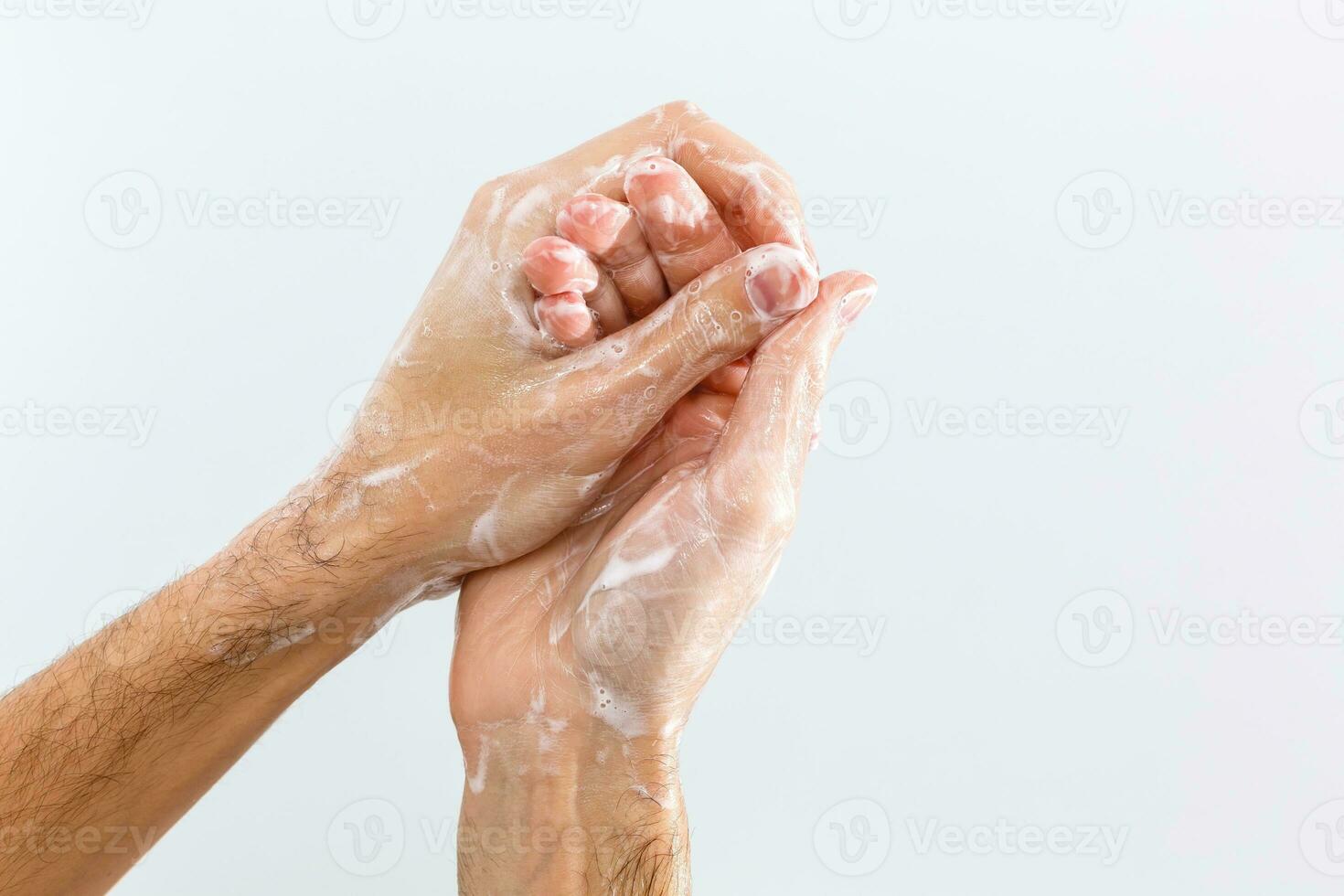 Close up image of washing hand against white background photo