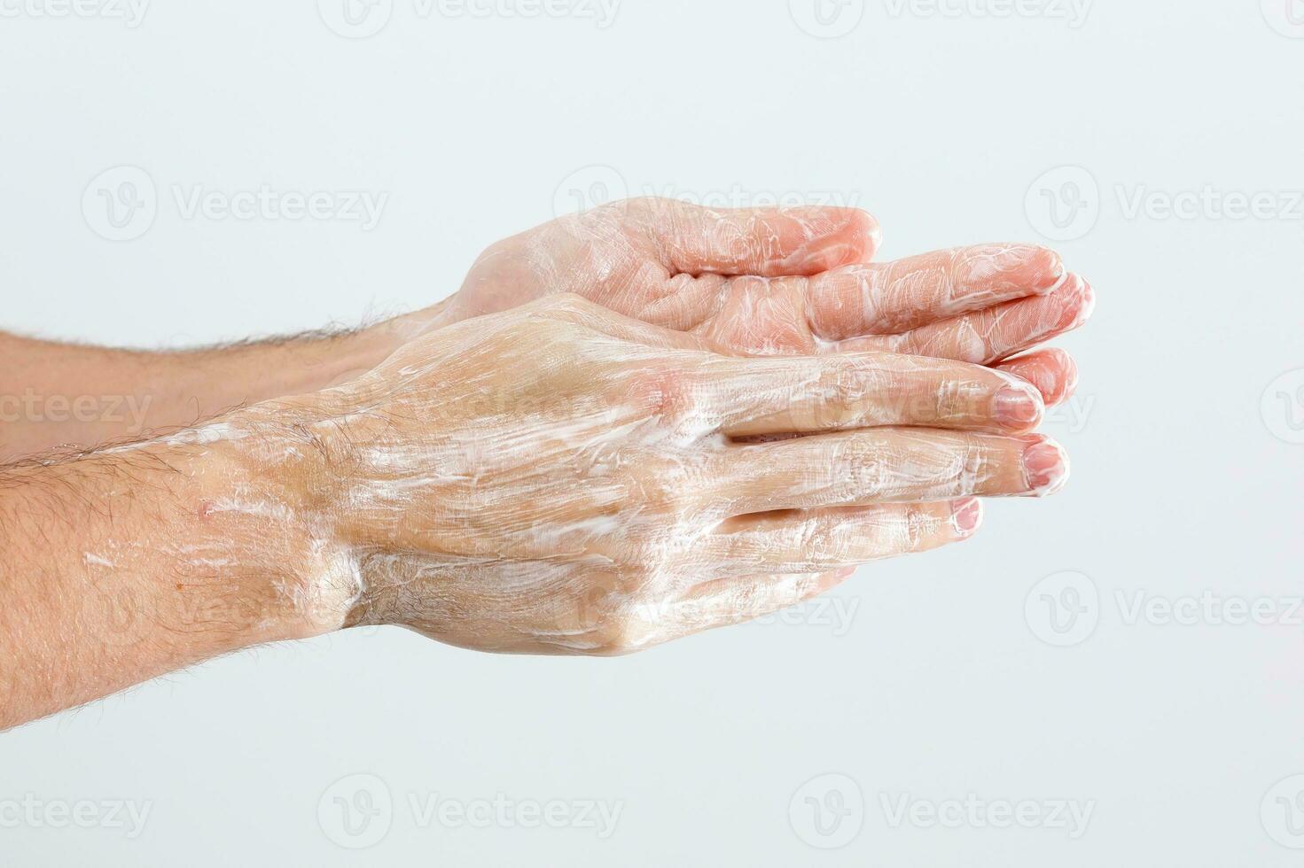 Close up image of washing hand against white background photo