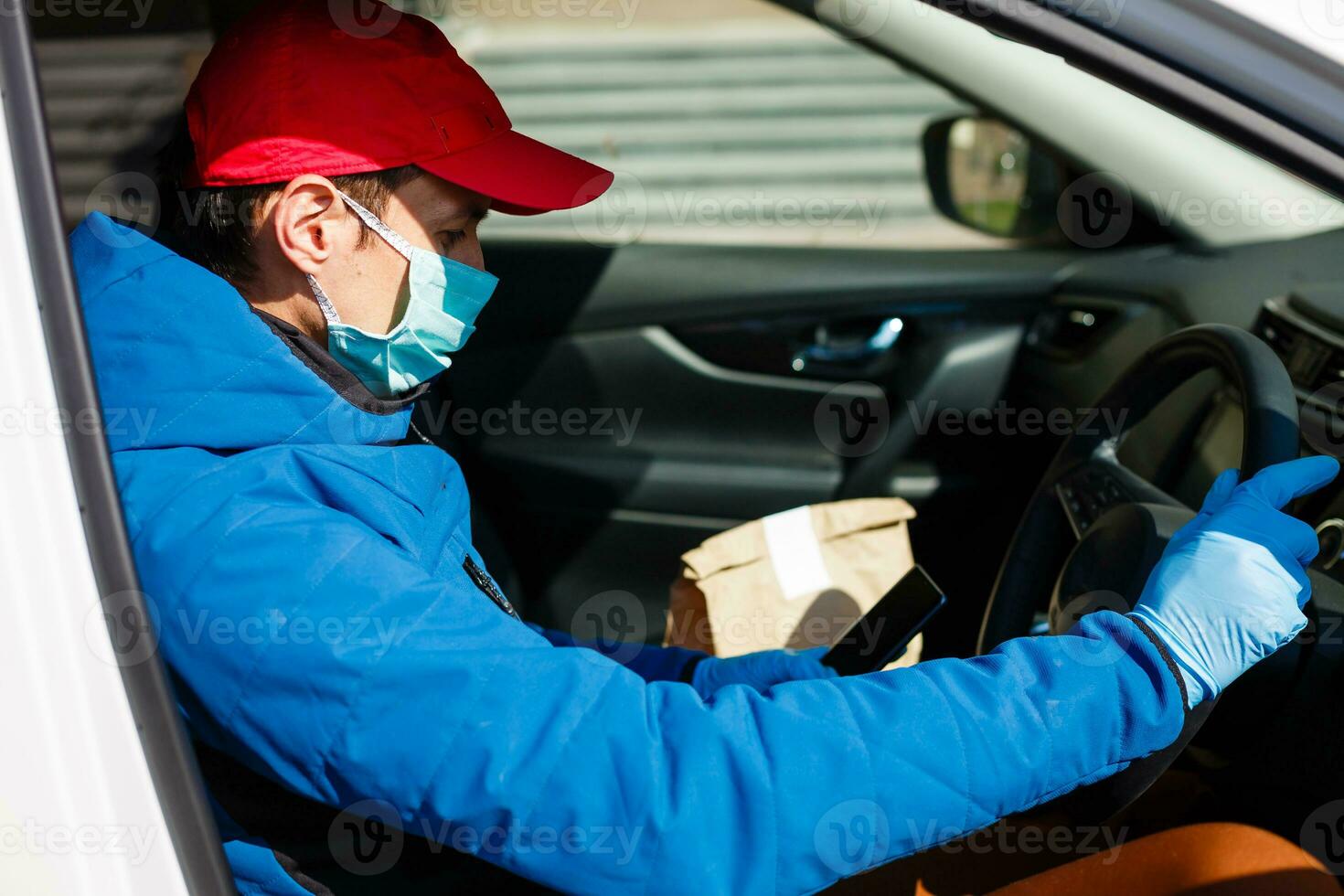 Close-up photos of drivers wearing masks to protect against dust and the spread of the flu. Covid 19. Inside the car front