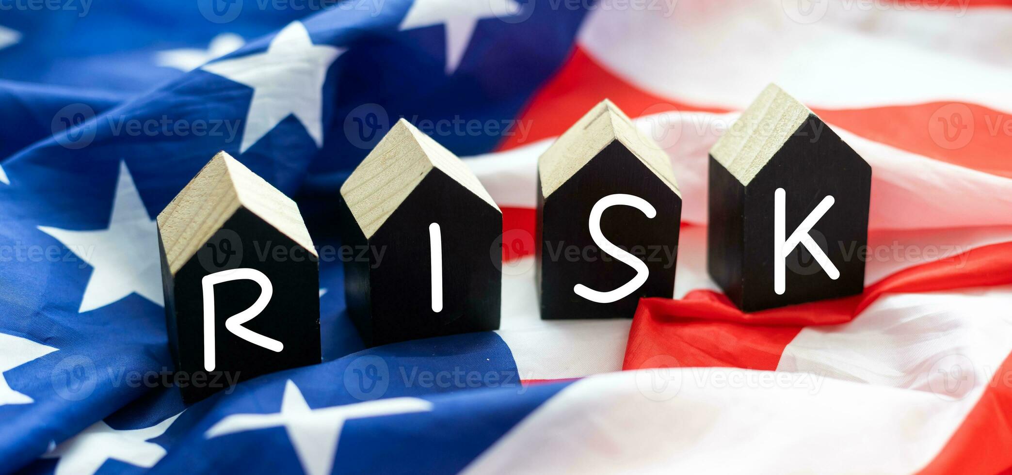 Man removes blocks with the word Risk. The concept of reducing possible risks. Insurance, stability support. Legal protection of business interests. Financial pillow. Favorable investment climate. photo
