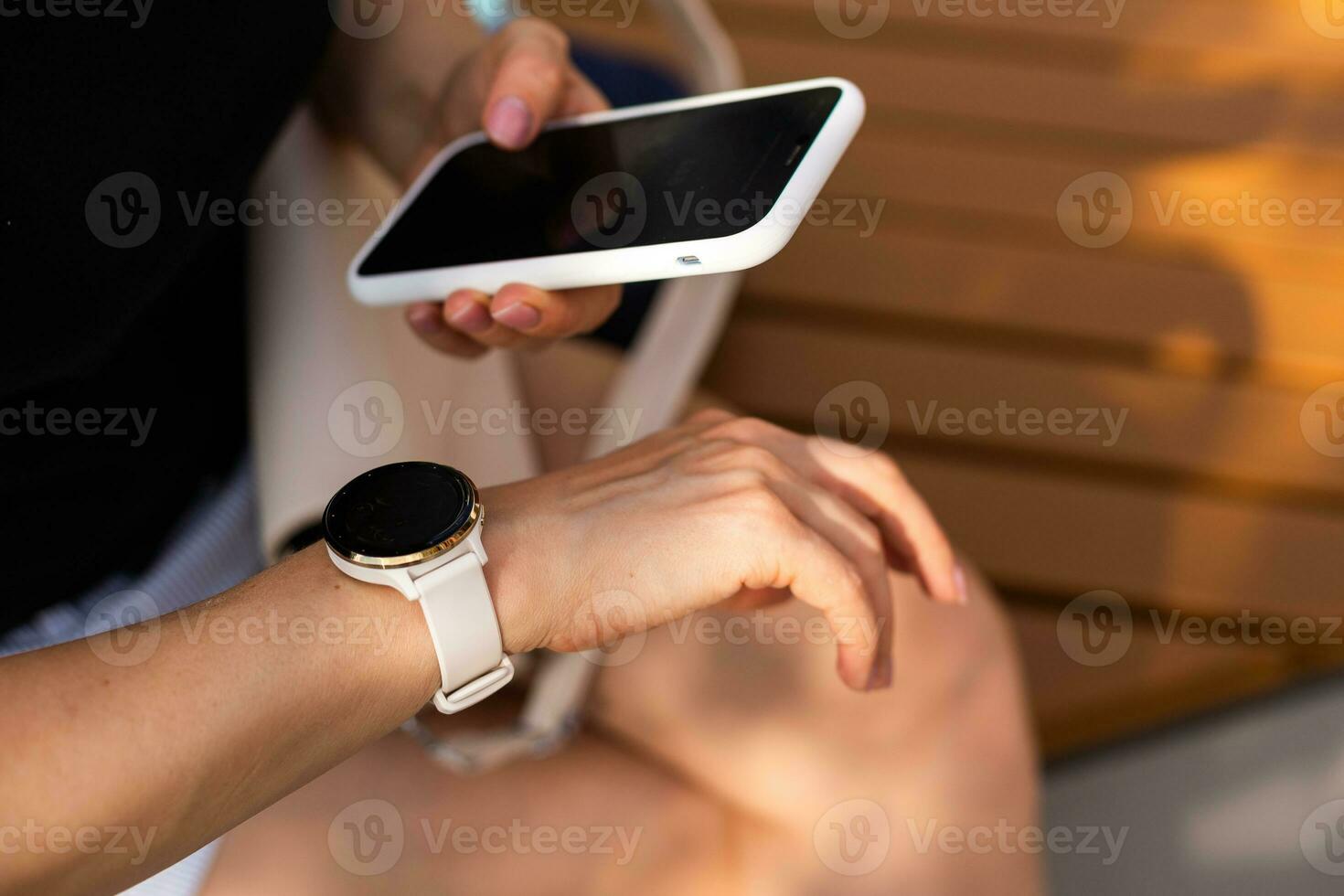 Hand holding the phone in front view and the finger pointing at the screen for mockup concept photo