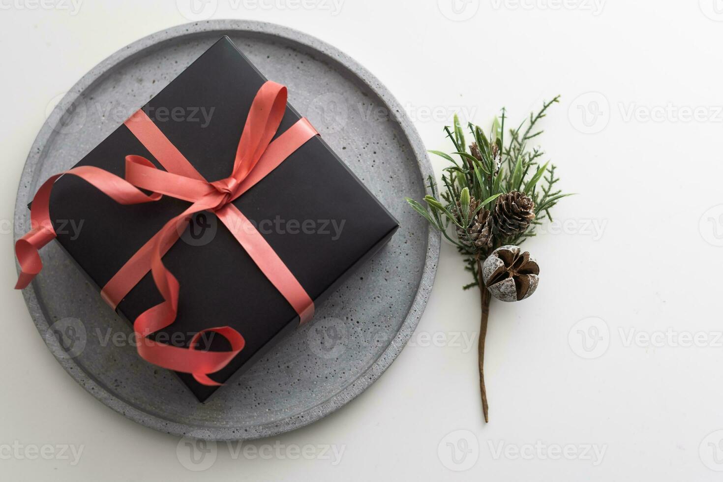 Christmas presents on round tray background photo