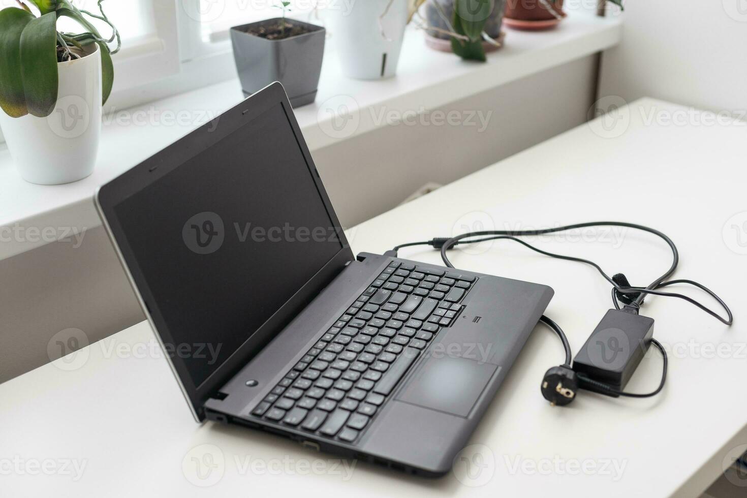 Image of charging a laptop photo