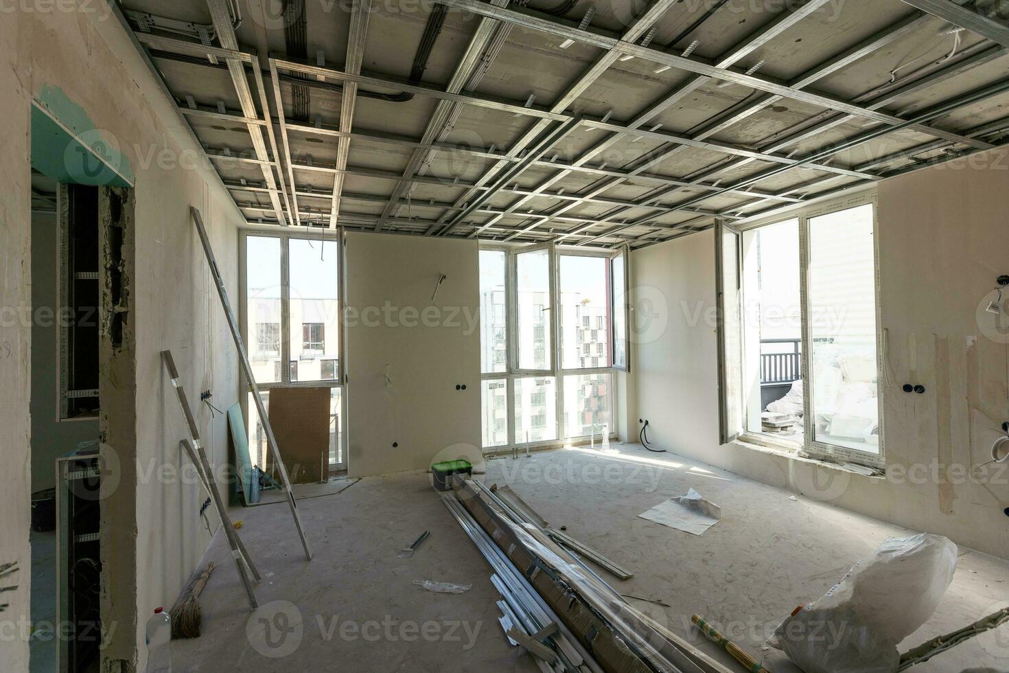 The metal frame of the ceiling, sound insulation, in the process of repairing an apartment photo