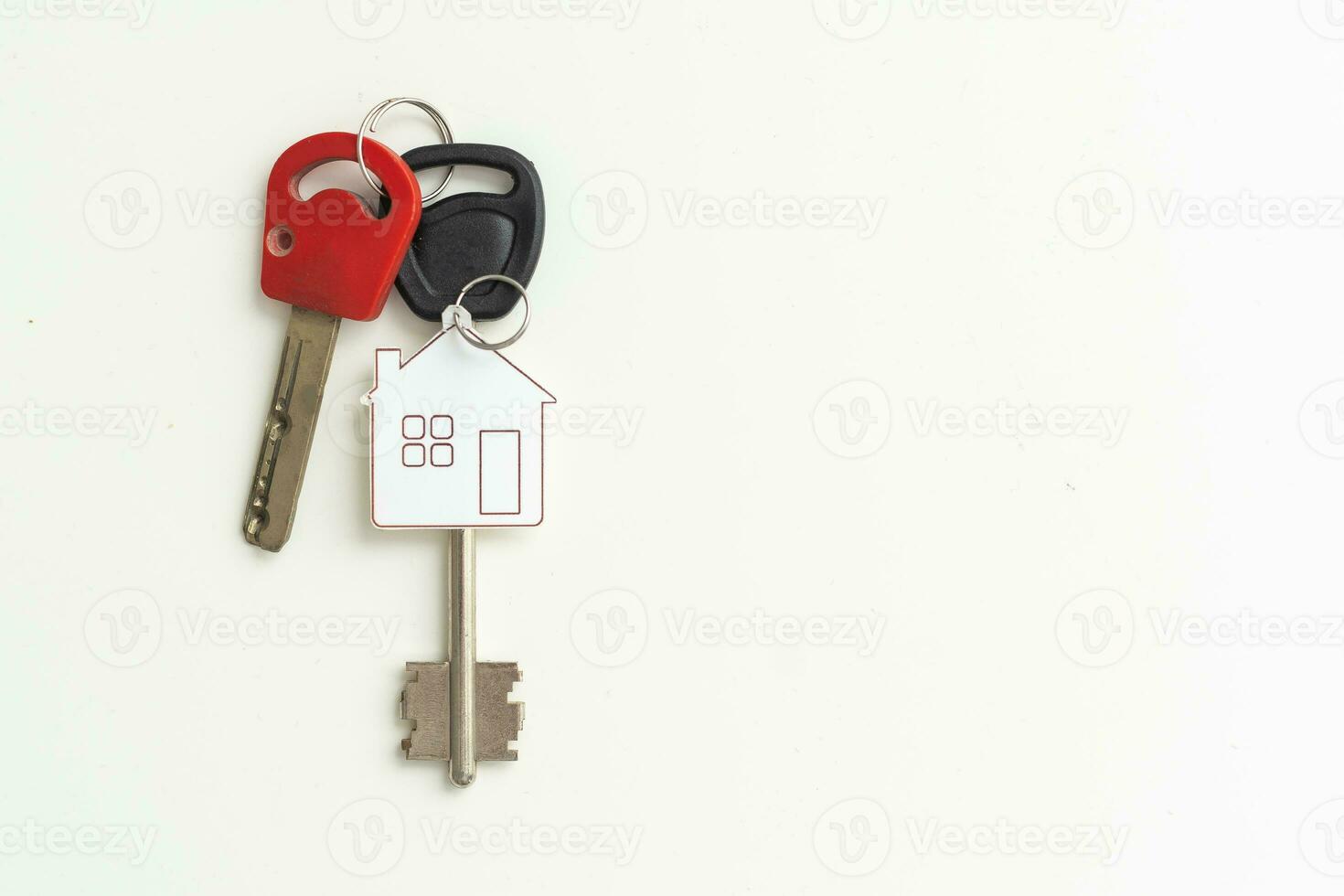 House keys with keychain. Isolated on white background photo